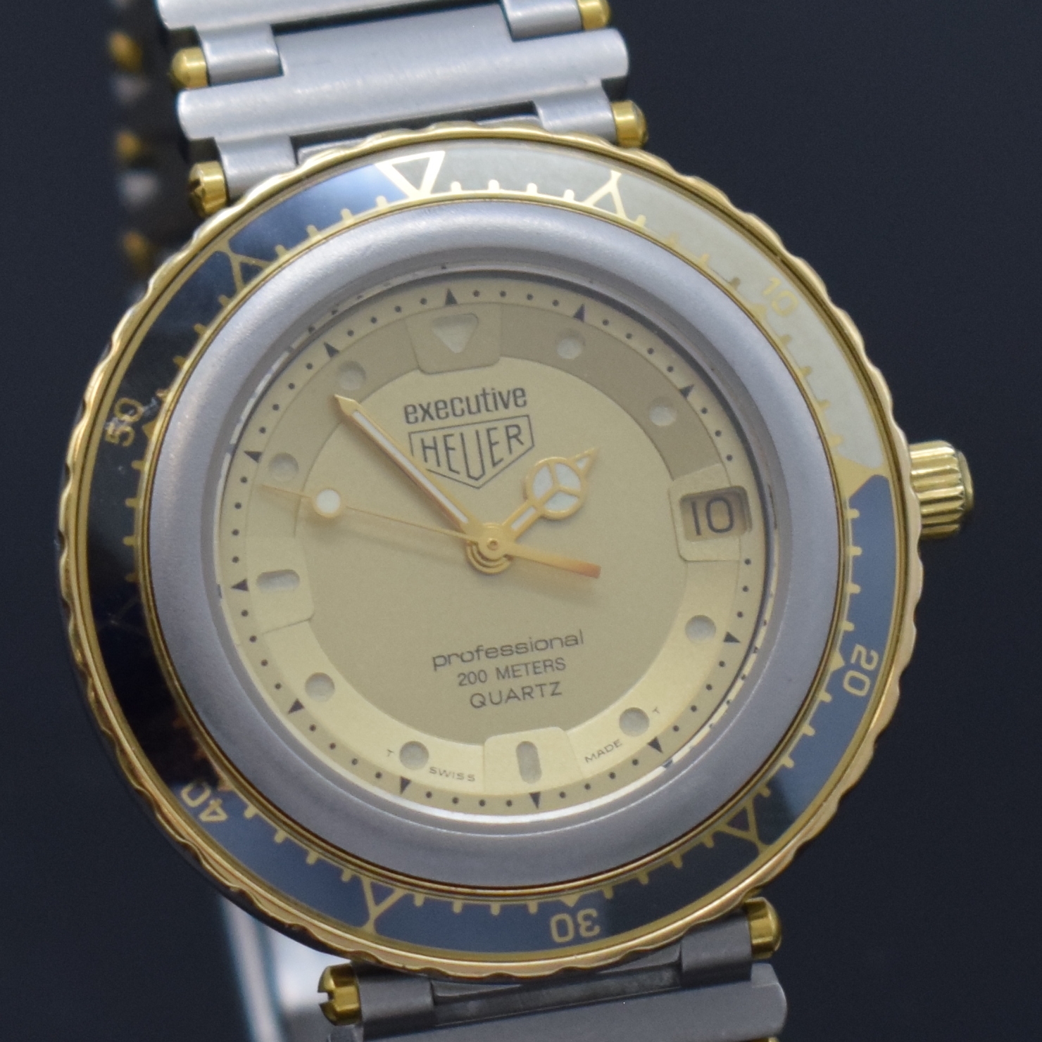 Detail c: HEUER professional Executive Armbanduhr Referenz 915.413, Schweiz um 1985, quarz, Edelstahlgeh. inkl. orig. Gliederband m. Faltschl., Boden u. Krone ...