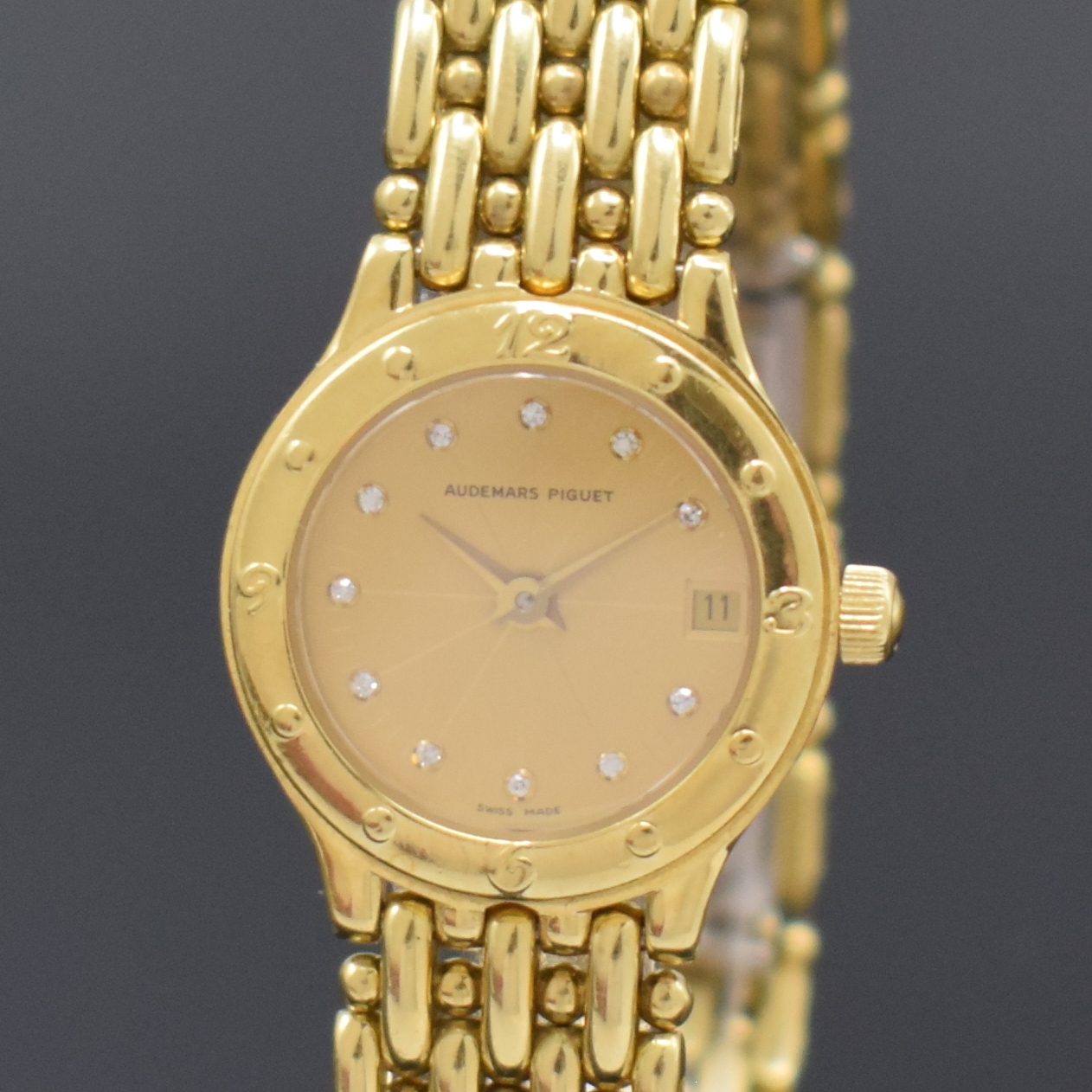Detail a: AUDEMARS PIGUET Meridian Damenarmbanduhr in GG 750/000, Schweiz um 1985, quarz, Gliederband m. dopp. Faltschl., 2-tlg. Geh., gold. Zifferbl. m. ...