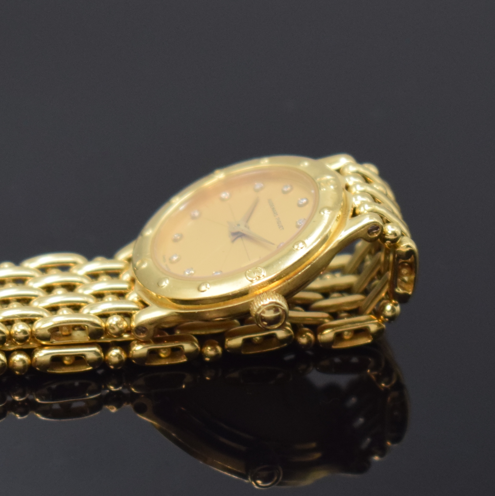 Detail d: AUDEMARS PIGUET Meridian Damenarmbanduhr in GG 750/000, Schweiz um 1985, quarz, Gliederband m. dopp. Faltschl., 2-tlg. Geh., gold. Zifferbl. m. ...