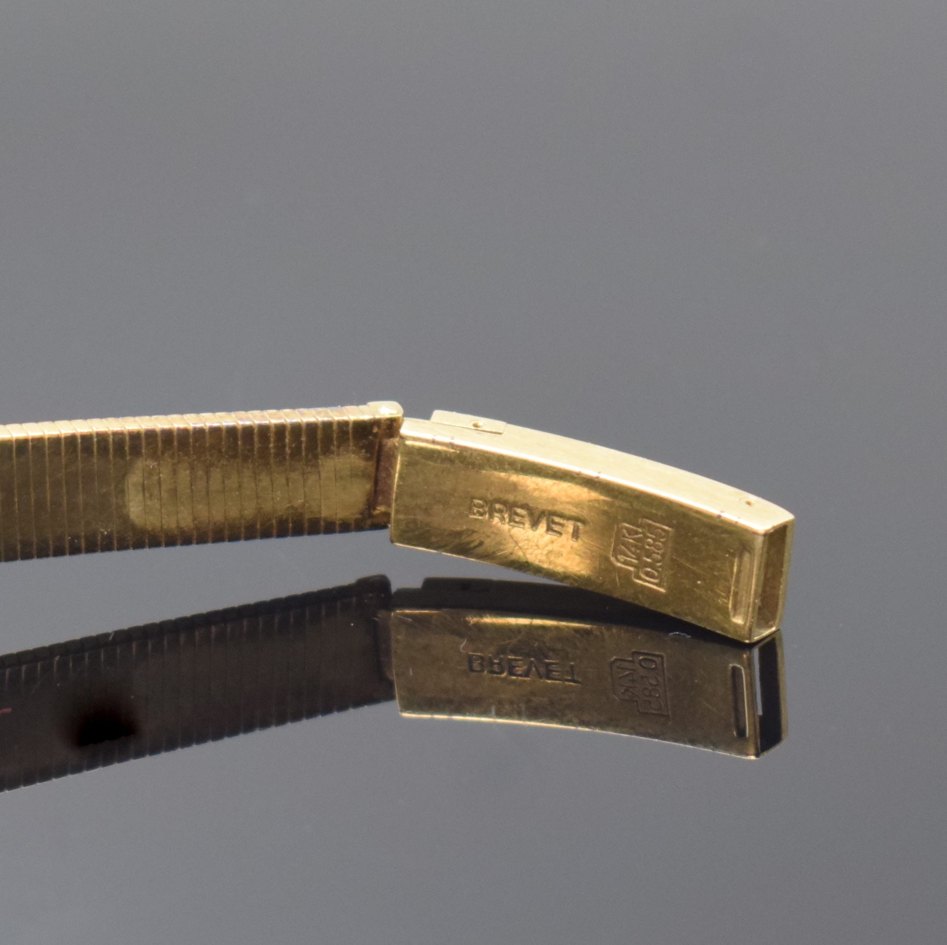 Detail b: ROXY Damenarmbanduhr in GG 585/000, Schweiz um 1965, Handaufzug, Goldband, Boden aufgedr., silb. Zifferbl., gold. Zeiger, Kal. Felsa 22, D. ca. 15 ...