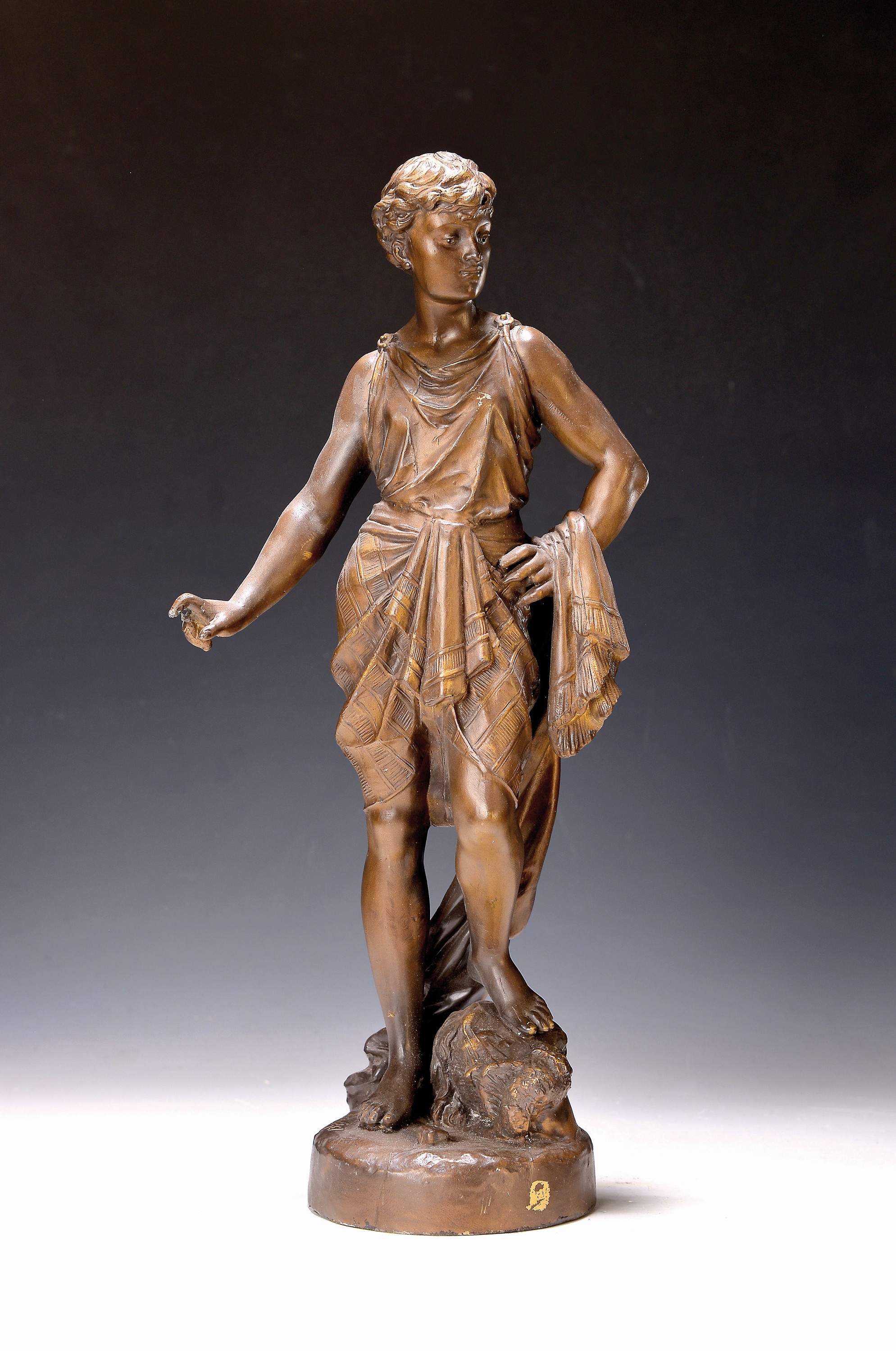 Nach Eutrope Bouret, 1833-1906, Bronzeskulptur, David als Triumphator mit dem Haupt des Goliath, auf Plinthe signiert, H. 44cm, Schwert und ein ...