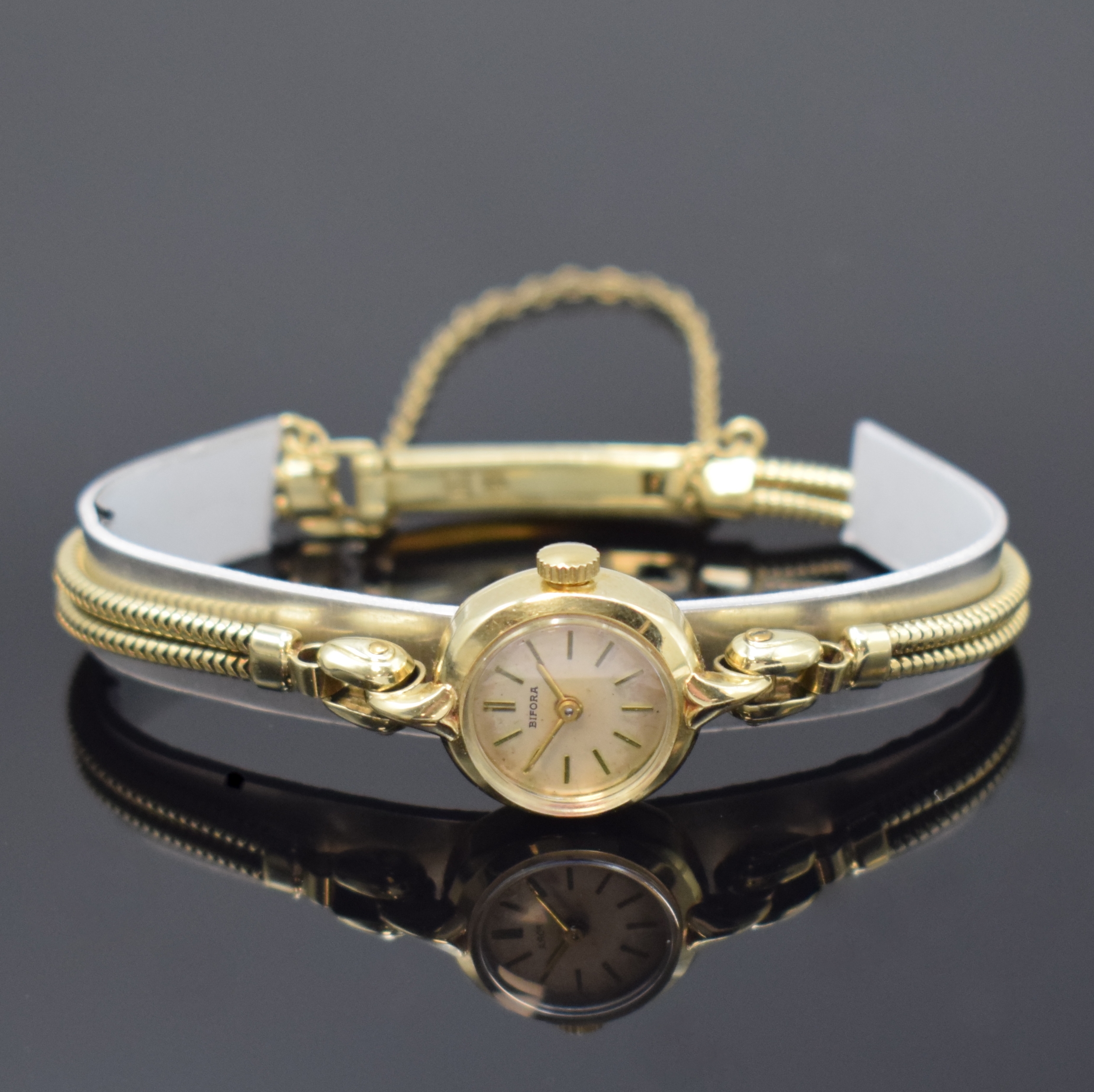 BIFORA Damenarmbanduhr in GG 585/000, Handaufzug, Schweiz 1960er Jahre, Boden aufgedr., 2-reihiges GG 585/000 Band m. Sicherheitskettchen, silb. ...