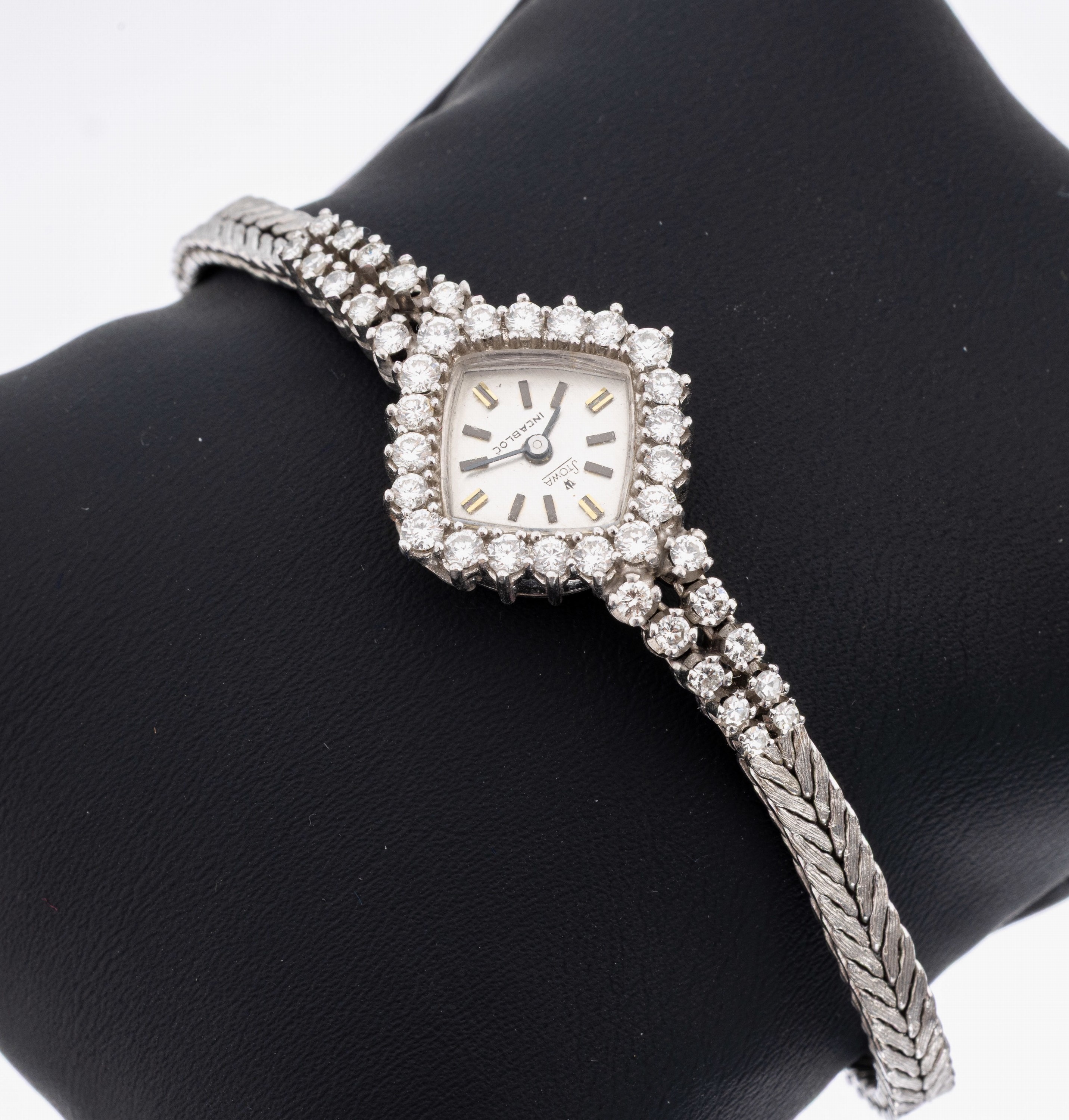 18 kt Gold Damenschmuckuhr mit Brillanten, WG 750/000, 8 8/8-Diamanten und 32 Brillanten zus. ca. 1.50 ct Weiß/si, STOWA, Incabloc Stoßs., ...