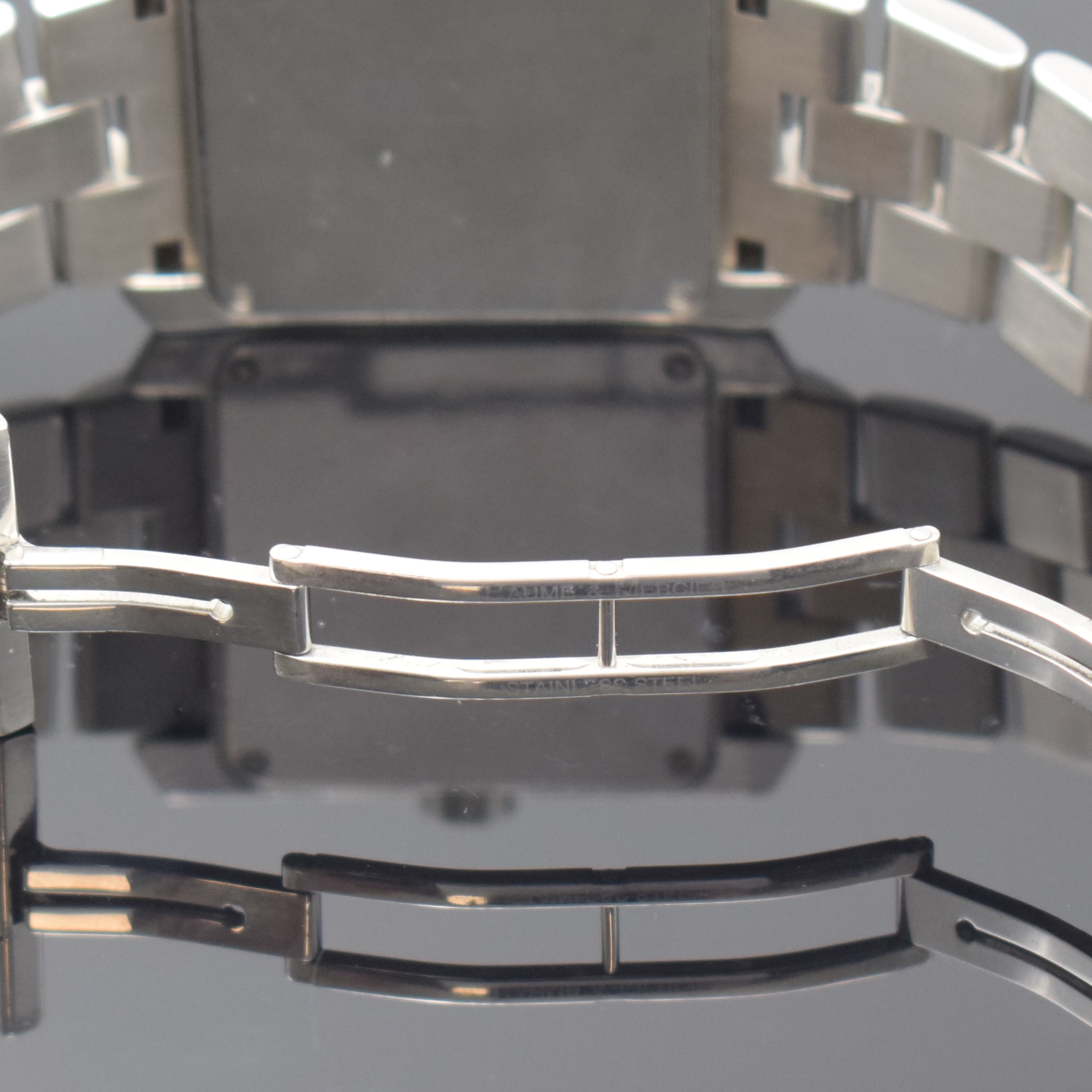 Detail d: BAUME & MERCIER Armbanduhr Hampton Square Referenz 65535, Automatik, Schweiz um 2010, Edelstahlgeh. inkl. Gliederband m. dopp. Faltschl., Boden ...
