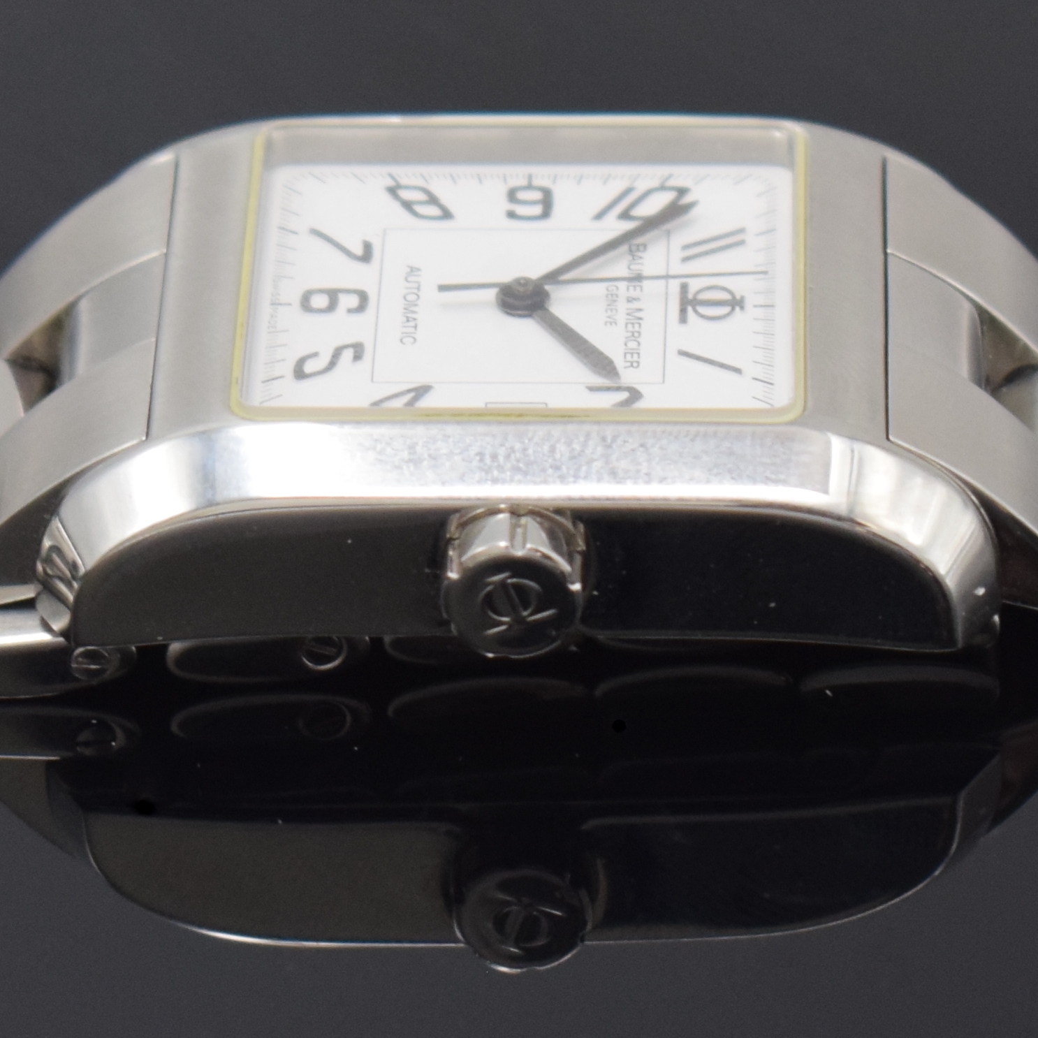 Detail e: BAUME & MERCIER Armbanduhr Hampton Square Referenz 65535, Automatik, Schweiz um 2010, Edelstahlgeh. inkl. Gliederband m. dopp. Faltschl., Boden ...