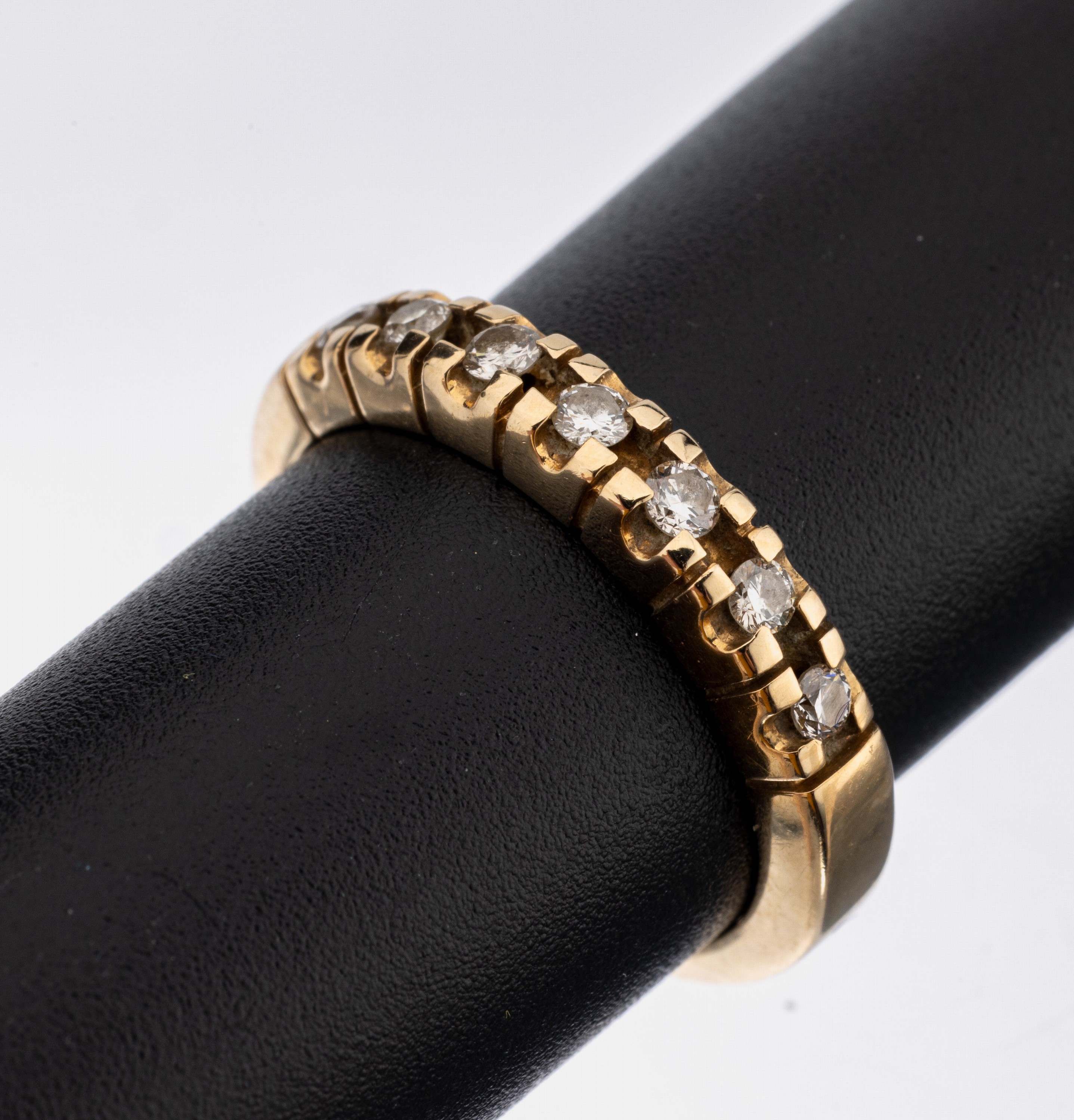 14 kt Gold Brillant-Ring, GG 585/000, 7 Brillanten zus. ca. 0.21 ct Weiß/si, ca. 4.5 g, RW 52
