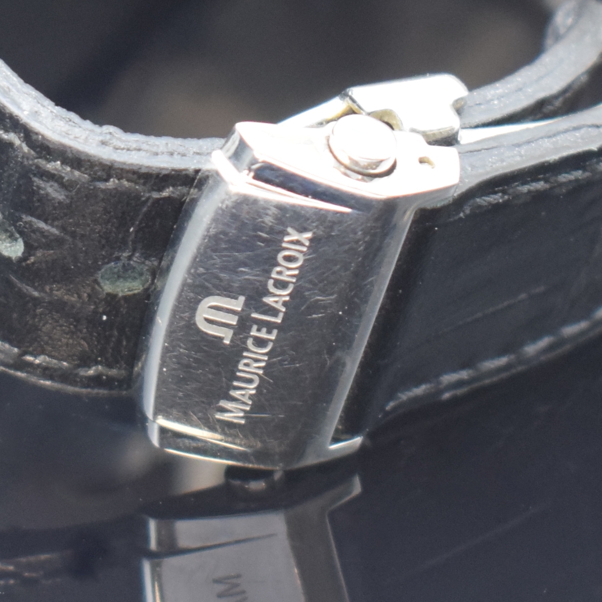Detail b: Maurice Lacroix Phase De Lune Herrenchronograph mit Vollkalender in Stahl Referenz LC1138, quarz, Boden aufgedr., Lederband m. orig. Faltschl., silb. ...
