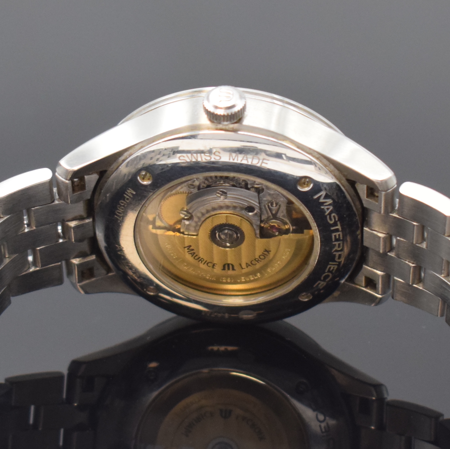 Detail d: Maurice Lacroix Herrenarmbanduhr in Stahl Referenz MP6907, Schweiz um 2010, Automatik, beids. vergl., Boden 4-fach verschr., orig. Stahlband m. dopp. ...