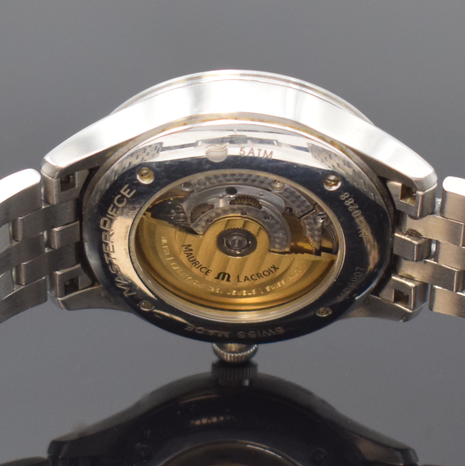 Detail e: Maurice Lacroix Herrenarmbanduhr in Stahl Referenz MP6907, Schweiz um 2010, Automatik, beids. vergl., Boden 4-fach verschr., orig. Stahlband m. dopp. ...