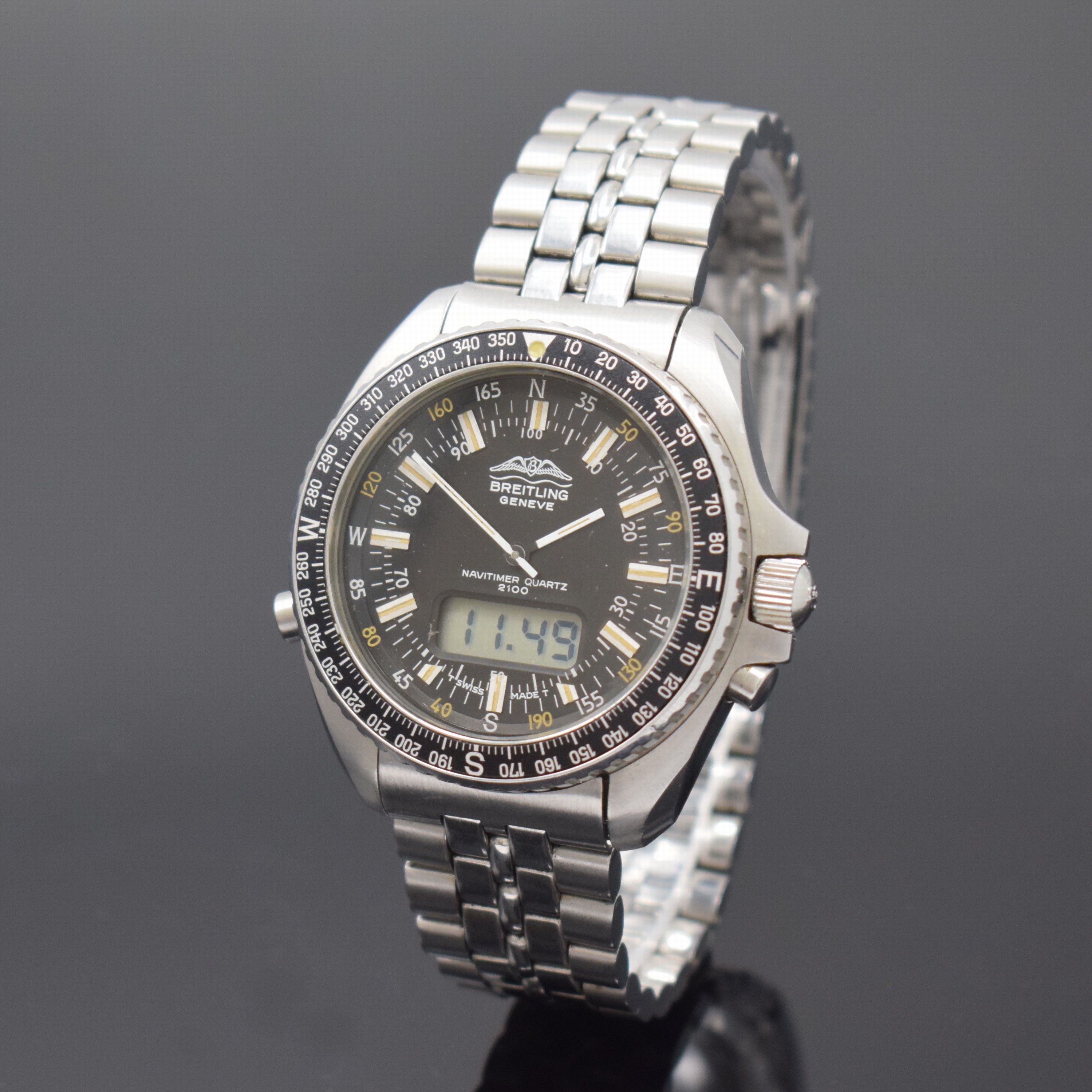 BREITLING Navitimer Quartz 2100 Pluton Multifunktionsuhr in Stahl Referenz 80190, Schweiz um 1980, verschr. Geh. inkl. orig. Stahlband m. Faltschl., ...