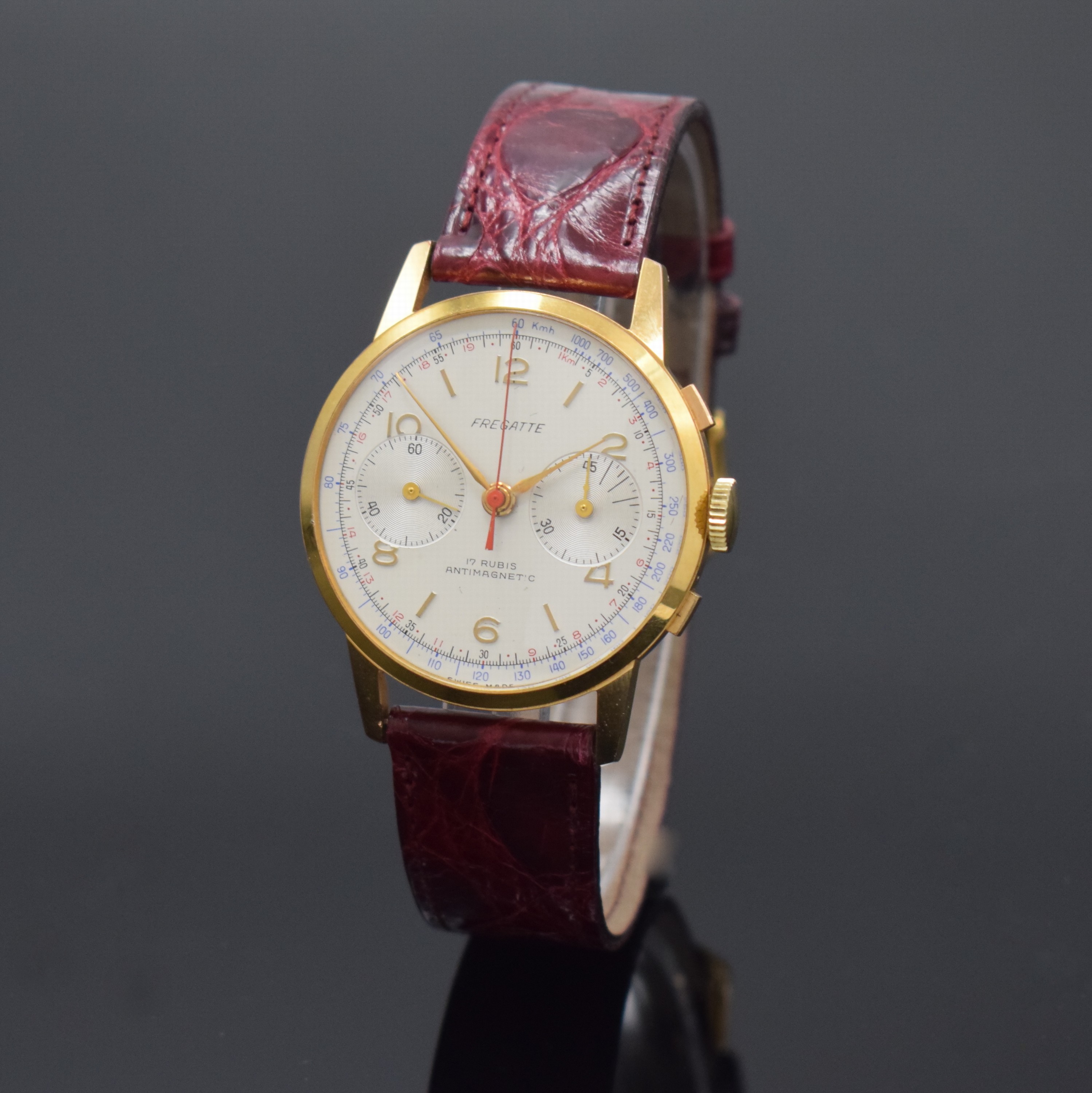 FREGATTE Armbandchronograph, Handaufzug, Schweiz um 1960, verg. Gehäuse, Stahlboden aufgedr., silb. Zifferbl. altersbed. l. fl./besch., gold. ...