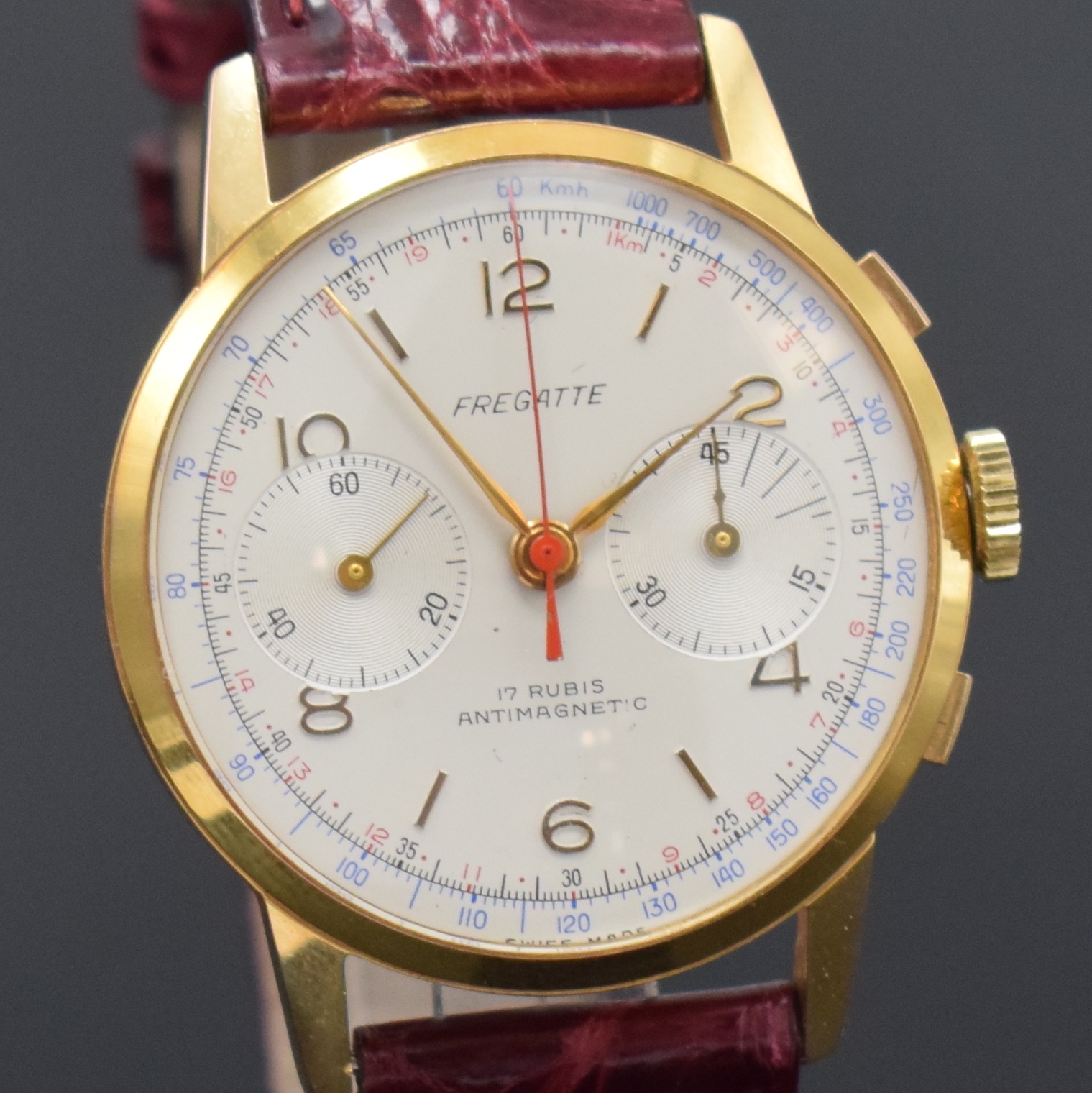 Detail c: FREGATTE Armbandchronograph, Handaufzug, Schweiz um 1960, verg. Gehäuse, Stahlboden aufgedr., silb. Zifferbl. altersbed. l. fl./besch., gold. ...