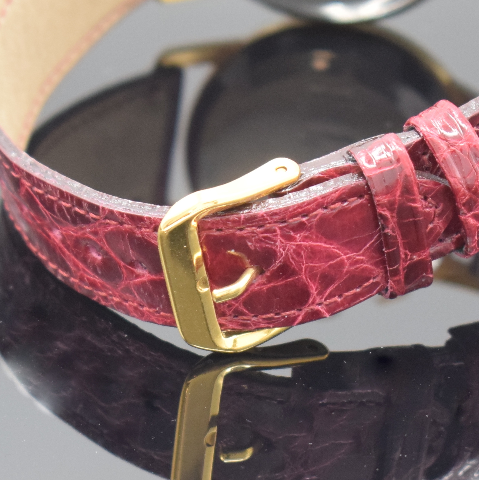 Detail d: FREGATTE Armbandchronograph, Handaufzug, Schweiz um 1960, verg. Gehäuse, Stahlboden aufgedr., silb. Zifferbl. altersbed. l. fl./besch., gold. ...