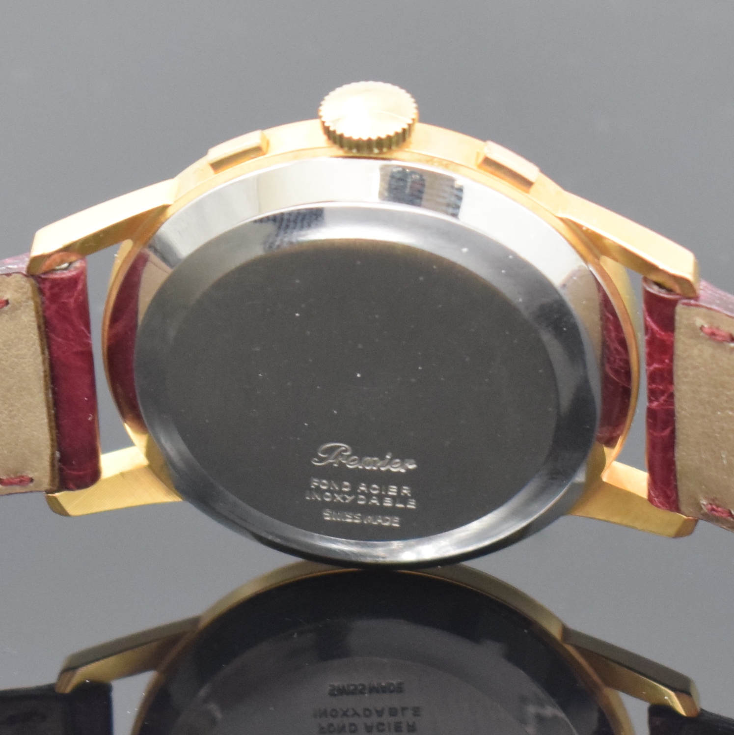 Detail e: FREGATTE Armbandchronograph, Handaufzug, Schweiz um 1960, verg. Gehäuse, Stahlboden aufgedr., silb. Zifferbl. altersbed. l. fl./besch., gold. ...