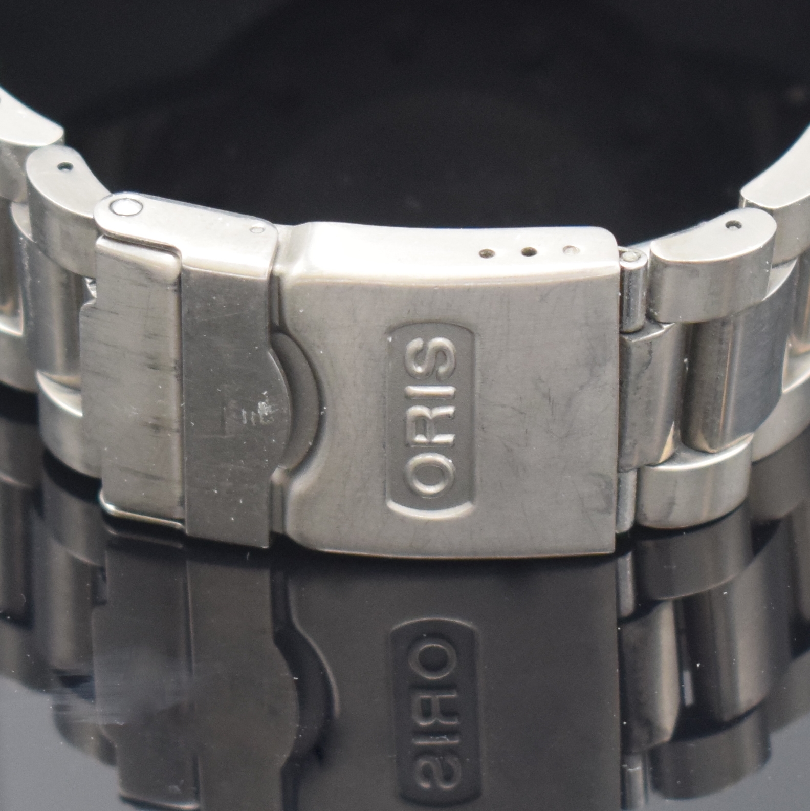 Detail d: ORIS Herrenarmbanduhr TT1 Referenz 633.7541, Automatik, Titangeh. inkl. orig. Gliederband m. Faltschl., Boden und Krone verschr., ab Herst. wasserd., ...