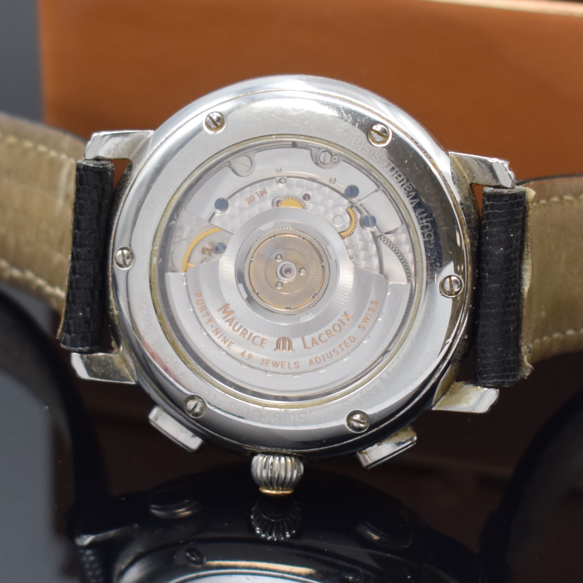 Detail d: MAURICE LACROIX Herrenchronograph mit Flyback, Schweiz um 2005, Automatik, beids. vergl. Edelstahlgeh., Lünette in GG 750/000, Boden 6-fach ...