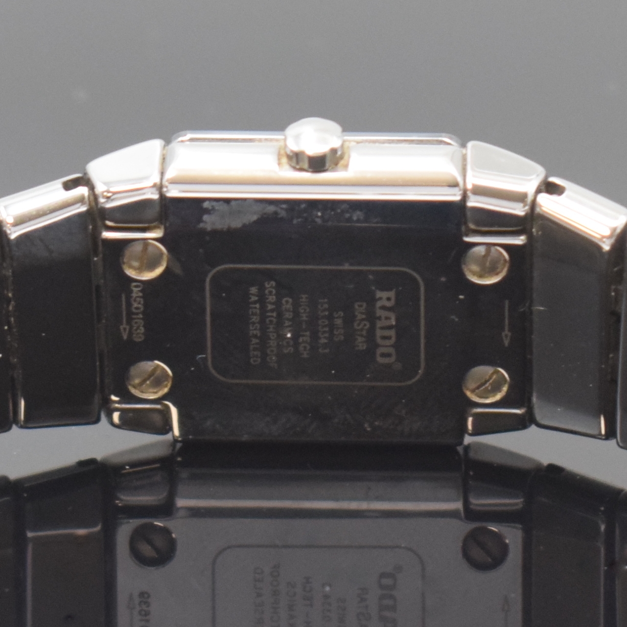 Detail c: RADO Diastar Damenarmbanduhr Referenz 153.0334.3, Schweiz um 2005, quarz, Boden 4 -fach verschr., orig. Keramikband m. dopp. Faltschl., schwarzes ...