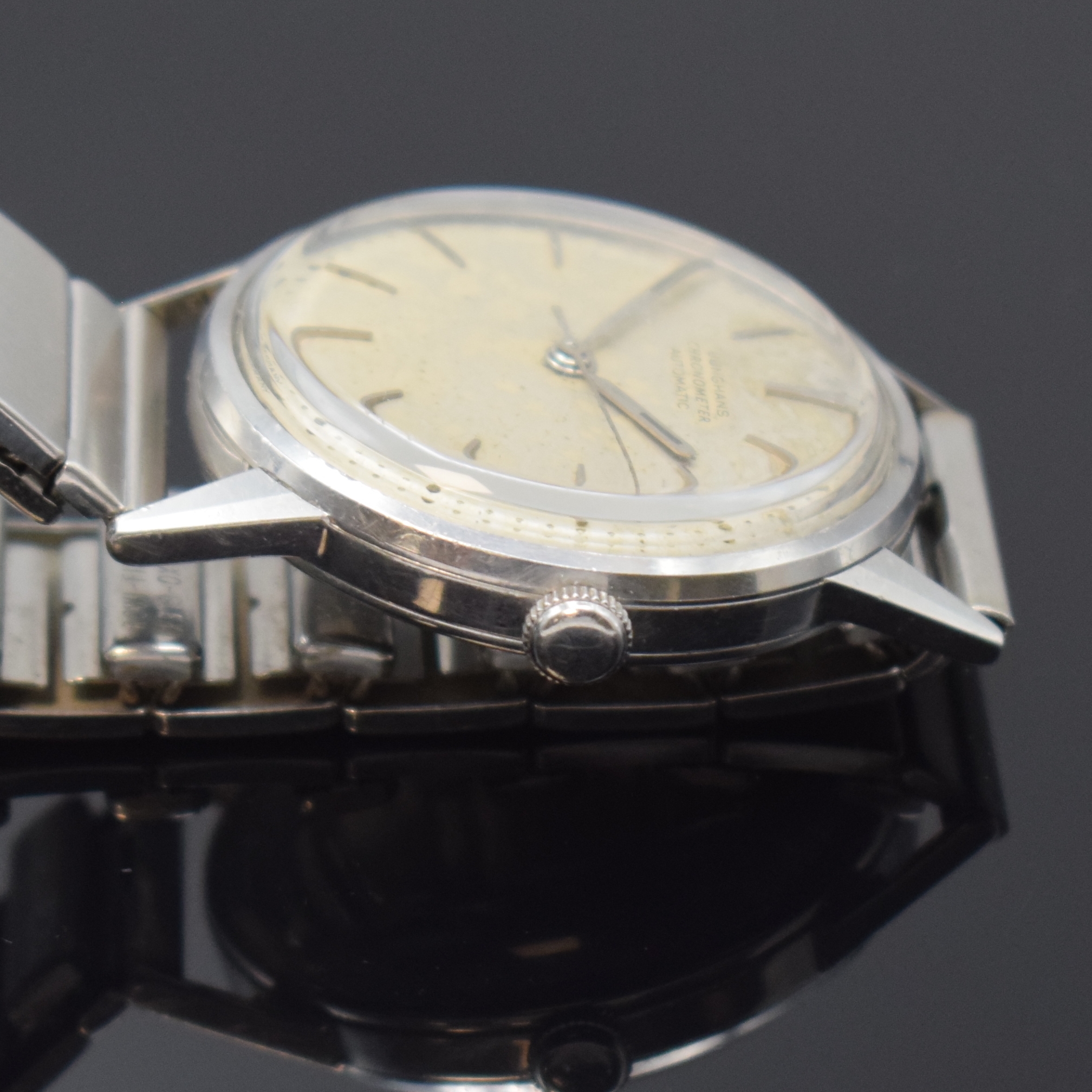 Detail b: JUNGHANS Chronometer Automatic in Stahl, Deutschland um 1960, unpoliertes Geh., Boden aufgedr., silb. Zifferbl. fl., silb. Indizes u. Zeiger, verg. ...
