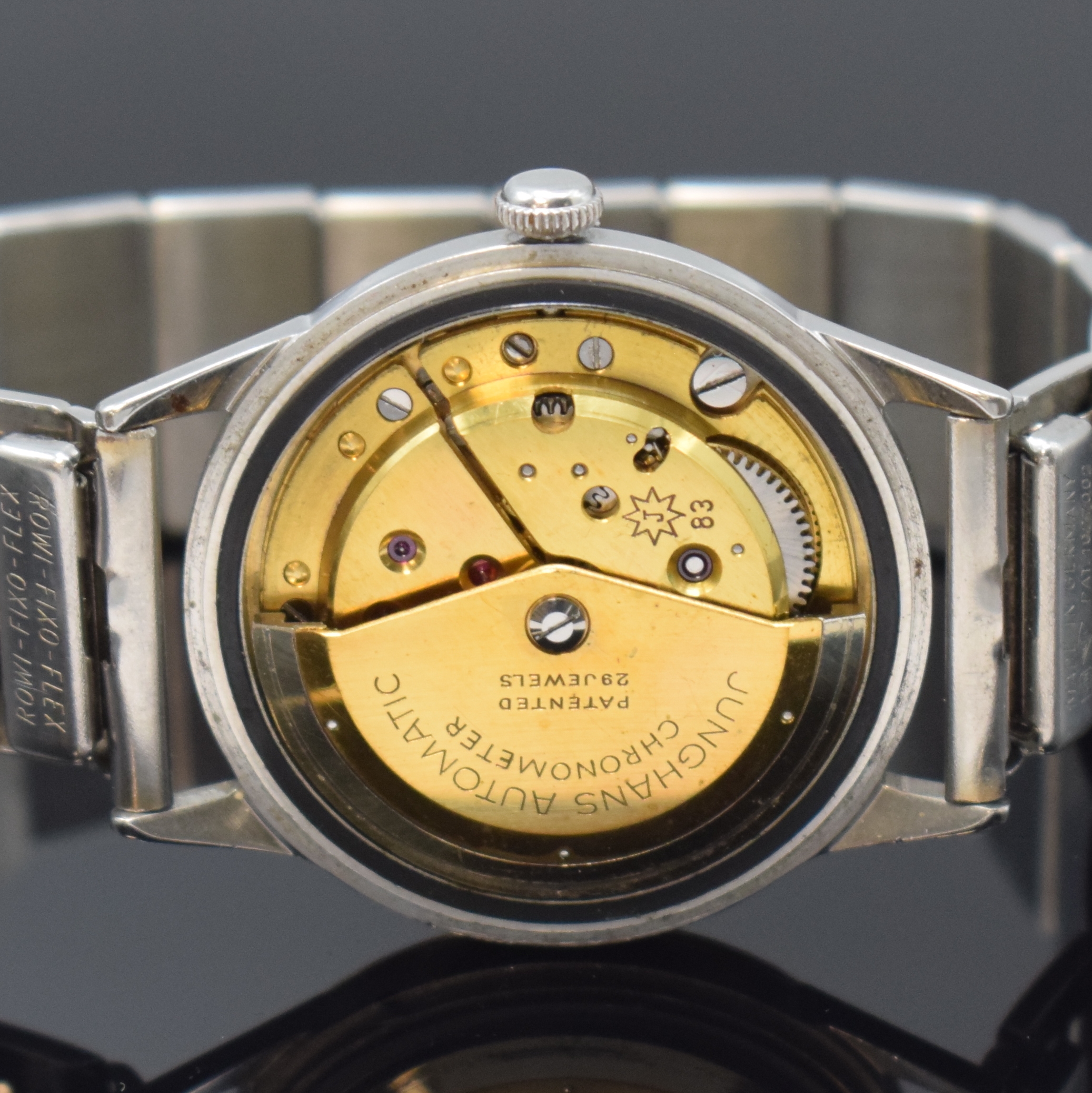Detail d: JUNGHANS Chronometer Automatic in Stahl, Deutschland um 1960, unpoliertes Geh., Boden aufgedr., silb. Zifferbl. fl., silb. Indizes u. Zeiger, verg. ...