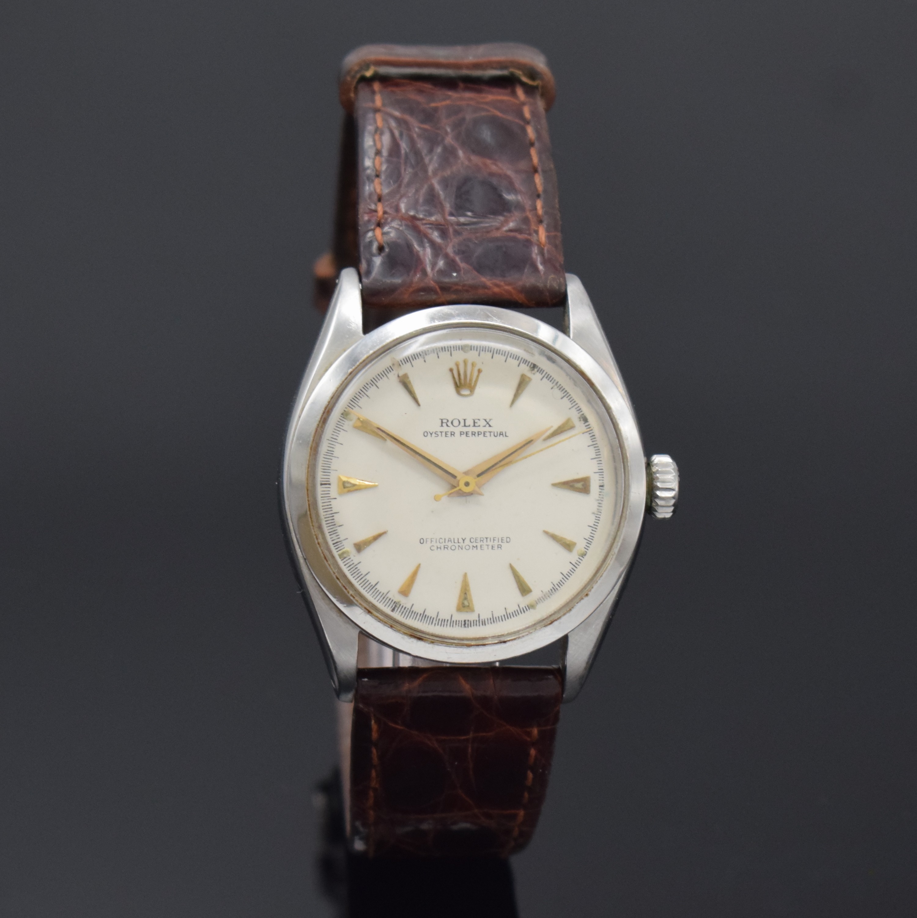 Detail b: ROLEX Oyster Perpetual Referenz 6284 Armbanduhr in Stahl, Schweiz um 1953, Automatik, verschr. Oystergeh., verschr. orig. Krone, silb. Zifferbl. ...