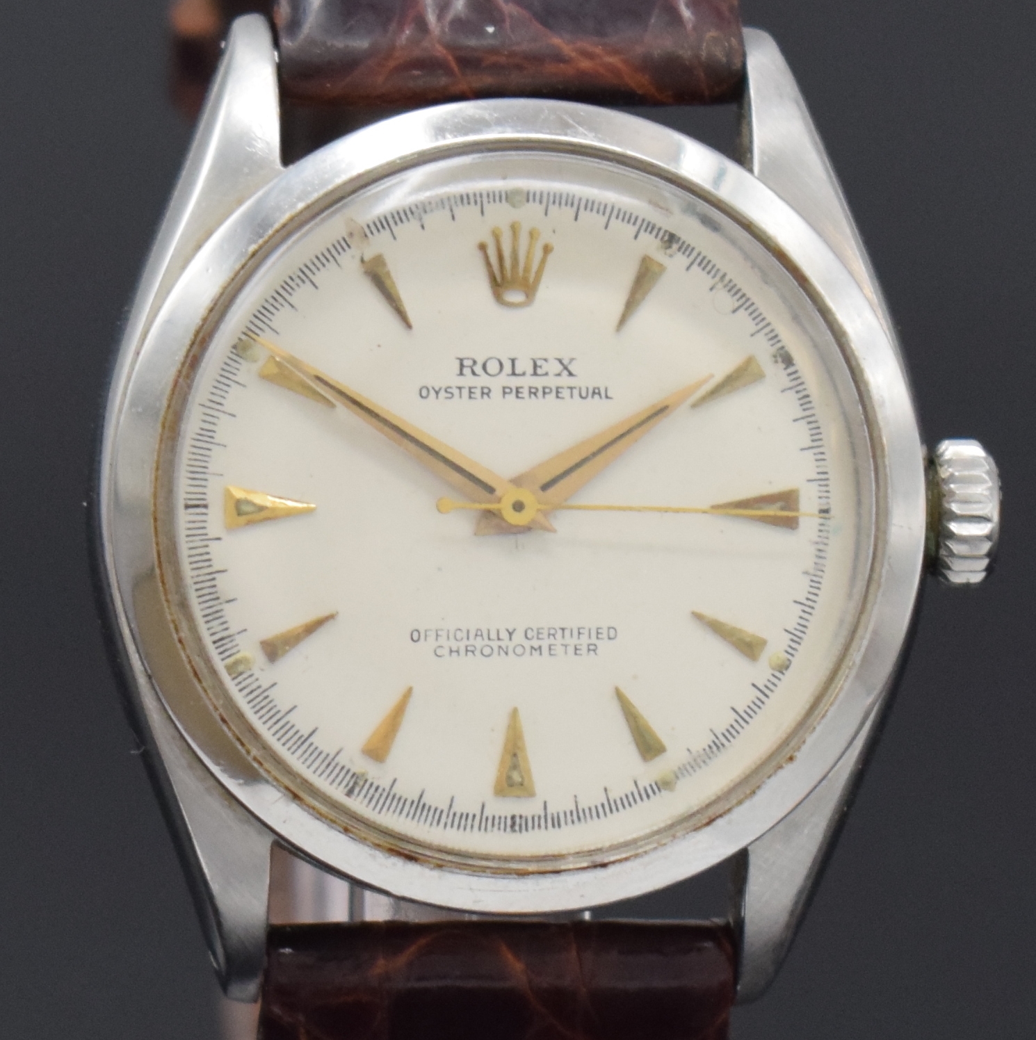 Detail c: ROLEX Oyster Perpetual Referenz 6284 Armbanduhr in Stahl, Schweiz um 1953, Automatik, verschr. Oystergeh., verschr. orig. Krone, silb. Zifferbl. ...
