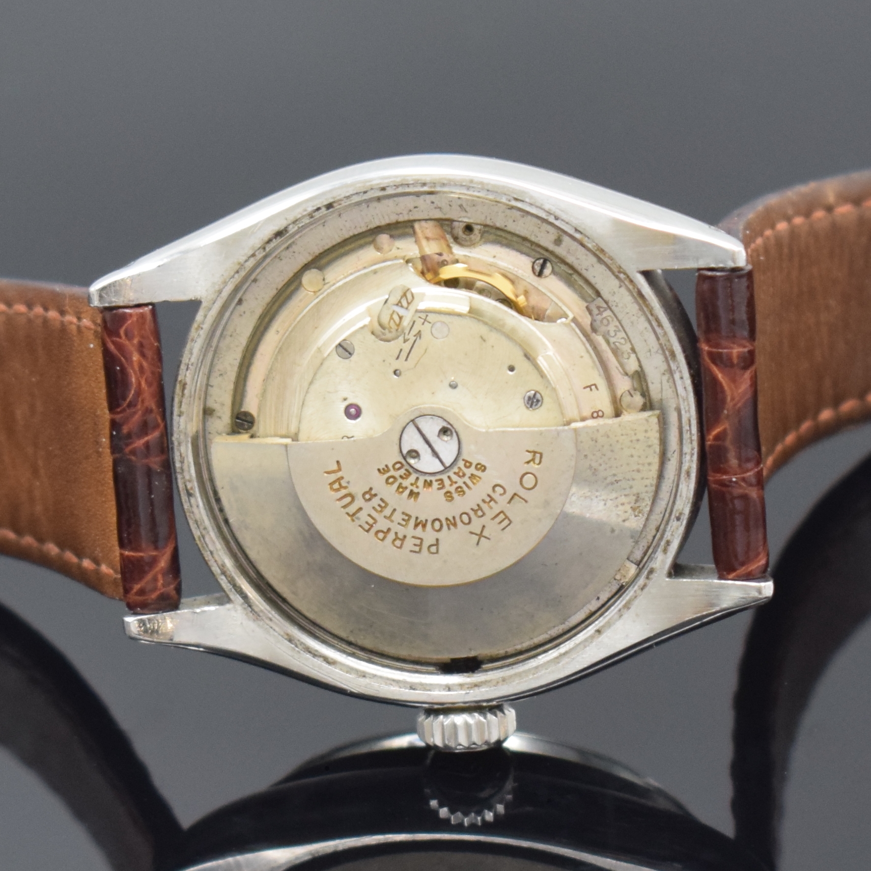 Detail h: ROLEX Oyster Perpetual Referenz 6284 Armbanduhr in Stahl, Schweiz um 1953, Automatik, verschr. Oystergeh., verschr. orig. Krone, silb. Zifferbl. ...