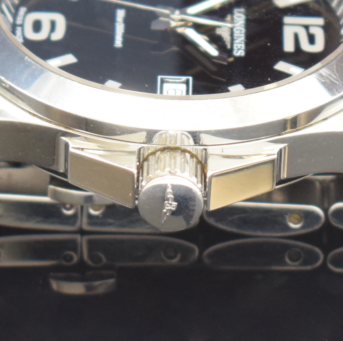 Detail e: LONGINES Herrenarmbanduhr Serie Conquest Referenz L3.659.4, Schweiz um 2013, quarz, Edelstahlgeh. inkl. Gliederband m. dopp. Faltschl., Boden und ...