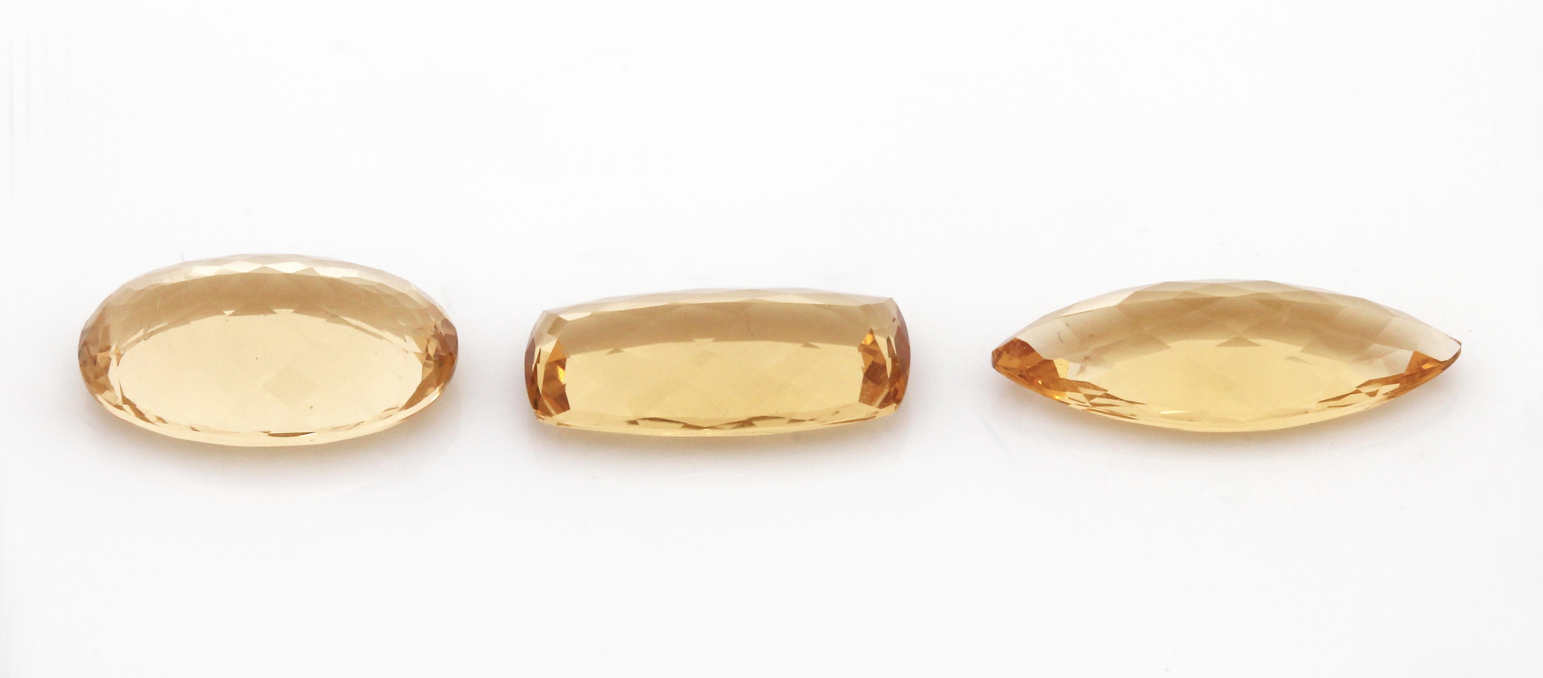 Detail a: Lot 3 lose facett. Goldberylle, zus. 15.18 ct,1 x oval, 1 x Navette, 1 x Baguette