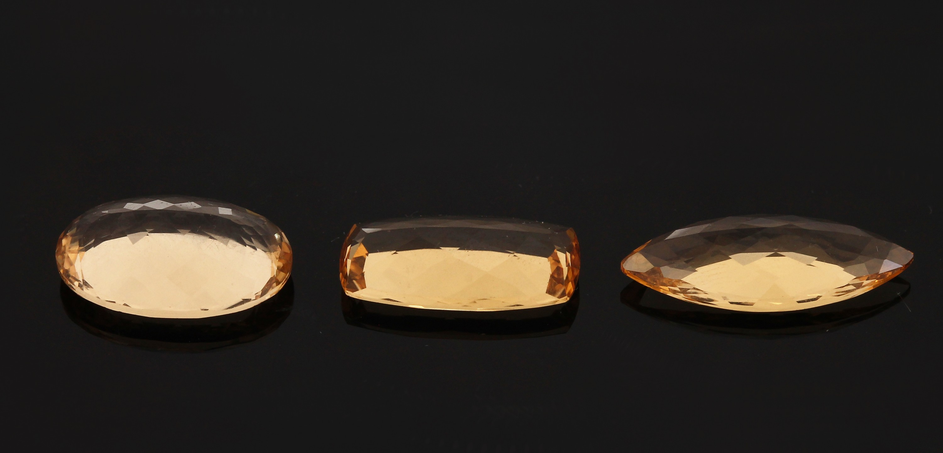 Detail c: Lot 3 lose facett. Goldberylle, zus. 15.18 ct,1 x oval, 1 x Navette, 1 x Baguette