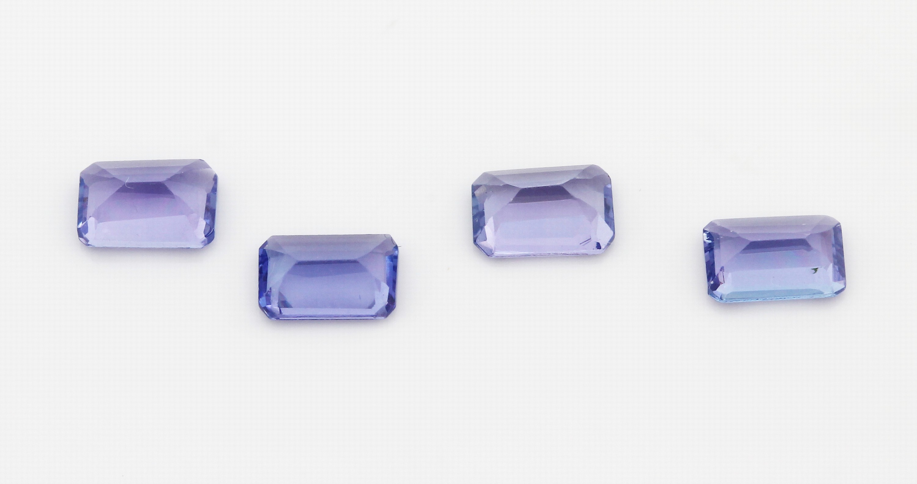 Detail a: Lot 4 lose facett. Tansanite, zus. 2.26 ct, 2 Paare, Baguetteschliff