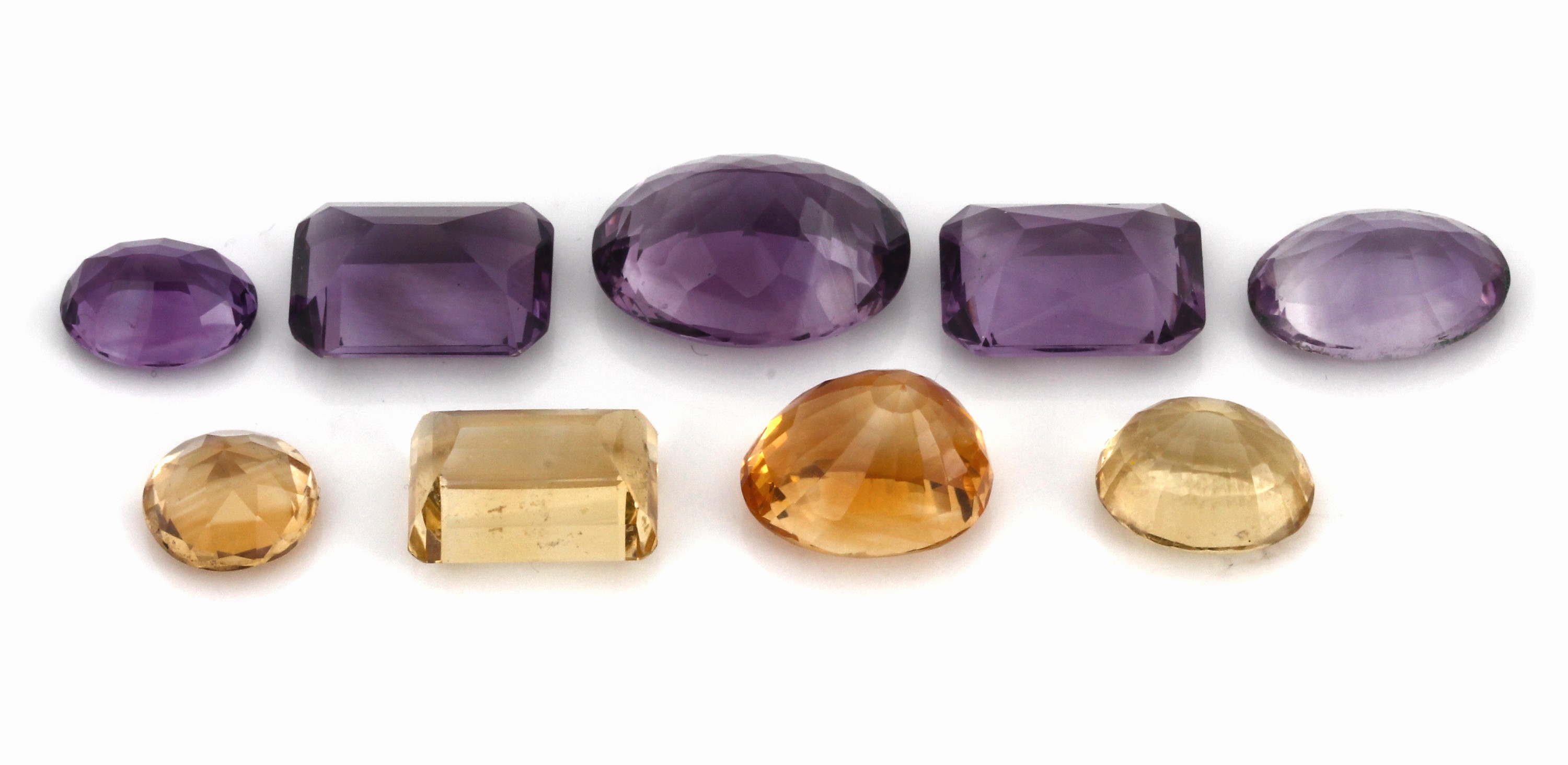 Detail a: Lot 9 lose facett. Citrine und Amethyste, zus.77.31 ct, 5 Amethyste und 4 Citrinen, in versch. Schliffformen