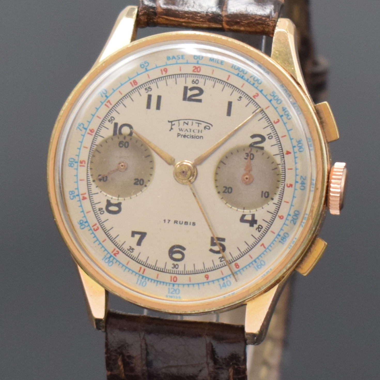 Detail a: Schaltradchronograph mit Kaliber Venus 150, Schweiz um 1960, Handaufzug, verg. Geh., Stahlboden u. Glasrand aufgedr., silb. Zifferbl. bez. Finite ...