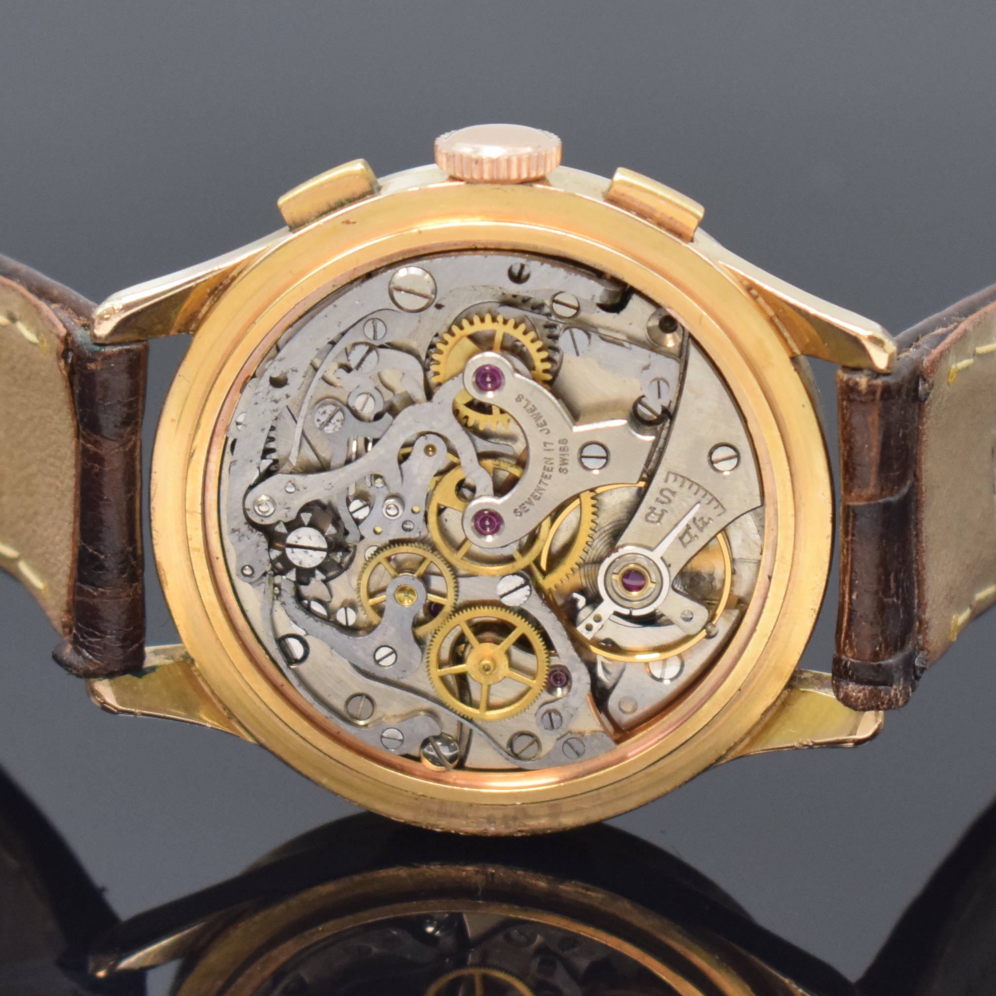 Detail d: Schaltradchronograph mit Kaliber Venus 150, Schweiz um 1960, Handaufzug, verg. Geh., Stahlboden u. Glasrand aufgedr., silb. Zifferbl. bez. Finite ...