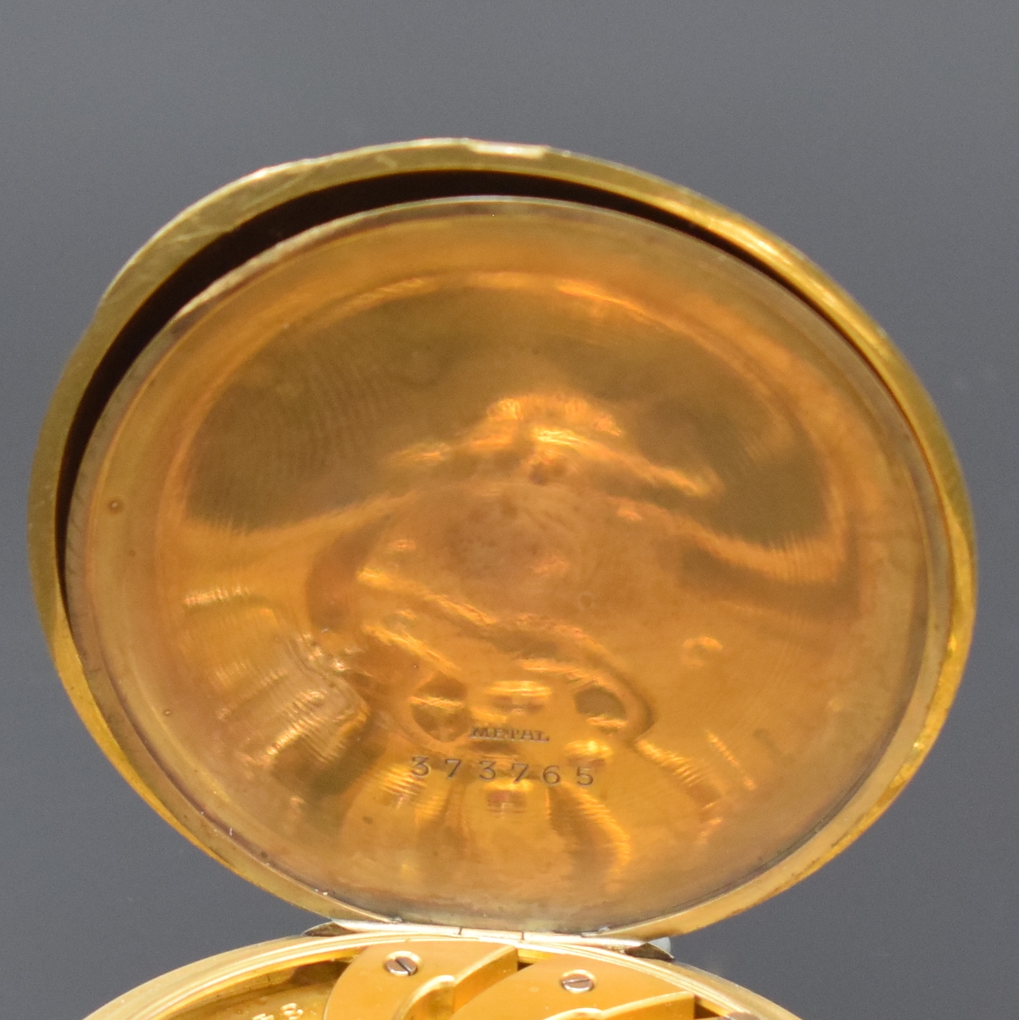 Detail e: ULYSSE NARDIN / W. TÜRLER, BERNE offene Herrentaschenuhr in GG 750/000, Schweiz um 1925, glattes Goldgeh., verg. Cuv., gold. Metallzifferbl. m. ...
