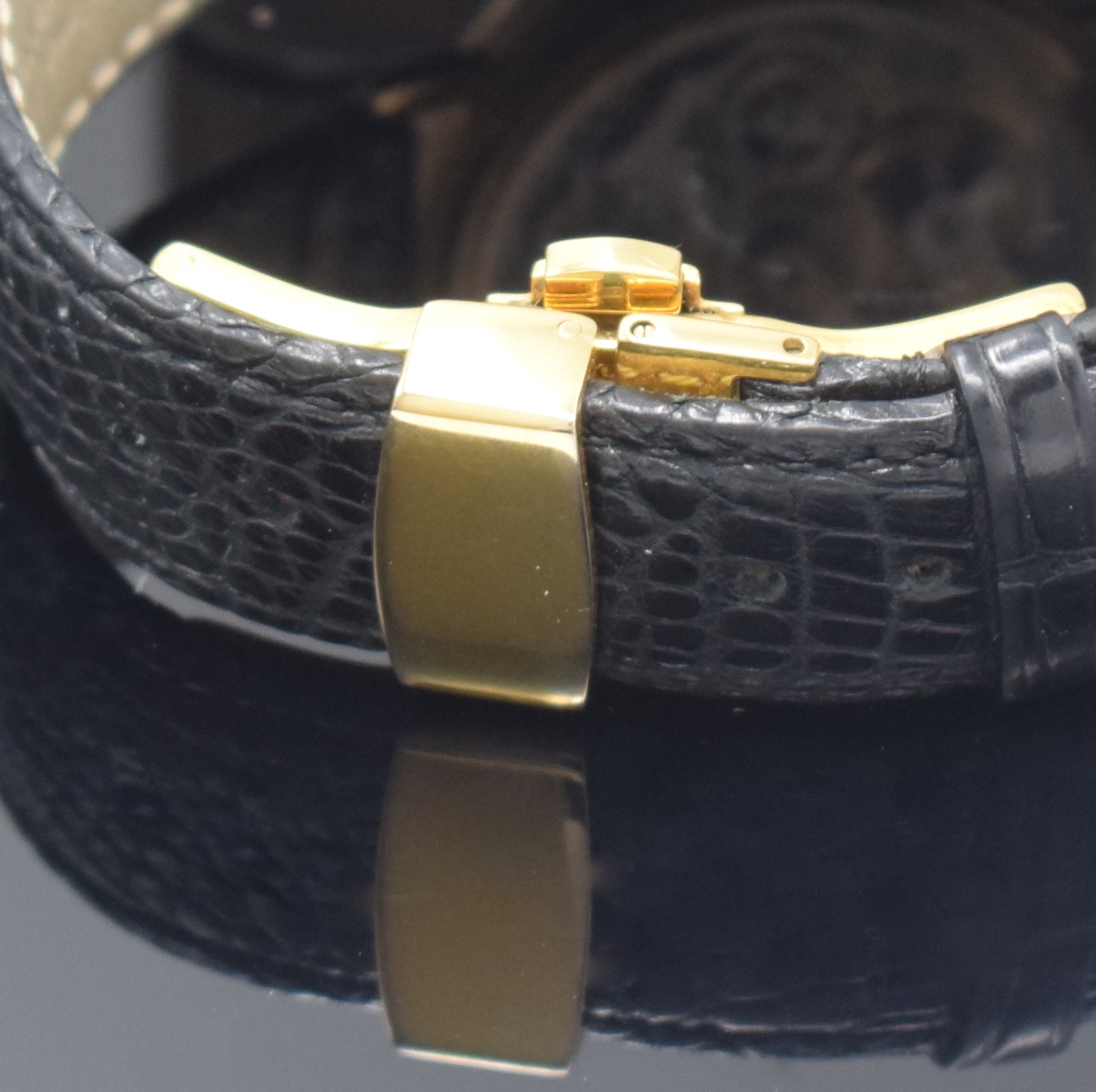 Detail d: ORFINA Herrenarmbanduhr mit Schaltradchronograph und Kalender in RG 750/000 Kaliber Valjoux 886, Schweiz um 1990, Handaufzug, beids. vergl. 3-tlg. ...