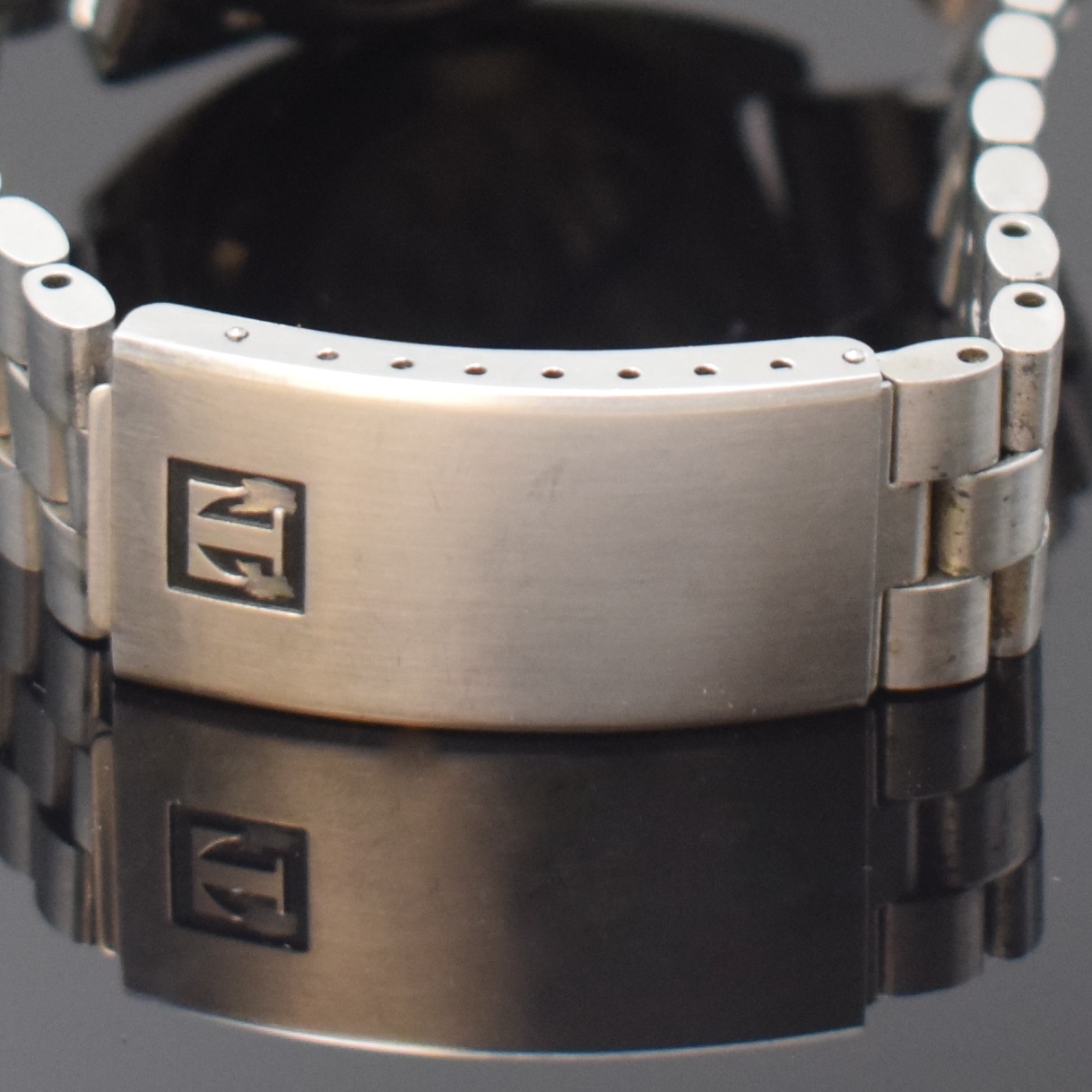 Detail b: ETERNA-MATIC Sevenday 36000 Fast Beat Herrenarmbanduhr Referenz 151T, Schweiz um 1970, Automatik, Boden verschr., Tissot- Stahlband m. Faltschl., ...