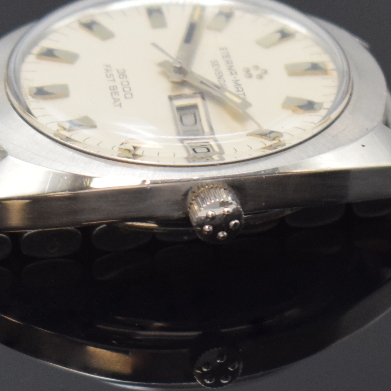 Detail c: ETERNA-MATIC Sevenday 36000 Fast Beat Herrenarmbanduhr Referenz 151T, Schweiz um 1970, Automatik, Boden verschr., Tissot- Stahlband m. Faltschl., ...