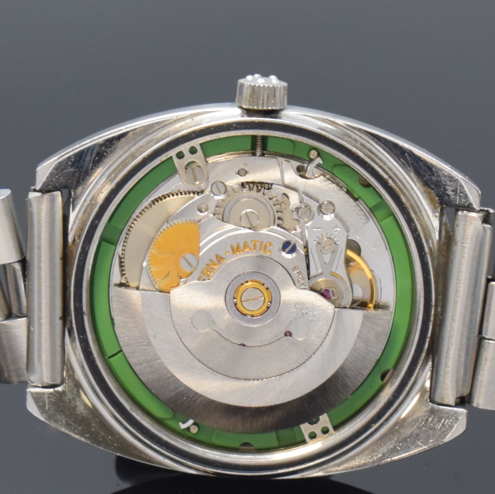 Detail e: ETERNA-MATIC Sevenday 36000 Fast Beat Herrenarmbanduhr Referenz 151T, Schweiz um 1970, Automatik, Boden verschr., Tissot- Stahlband m. Faltschl., ...