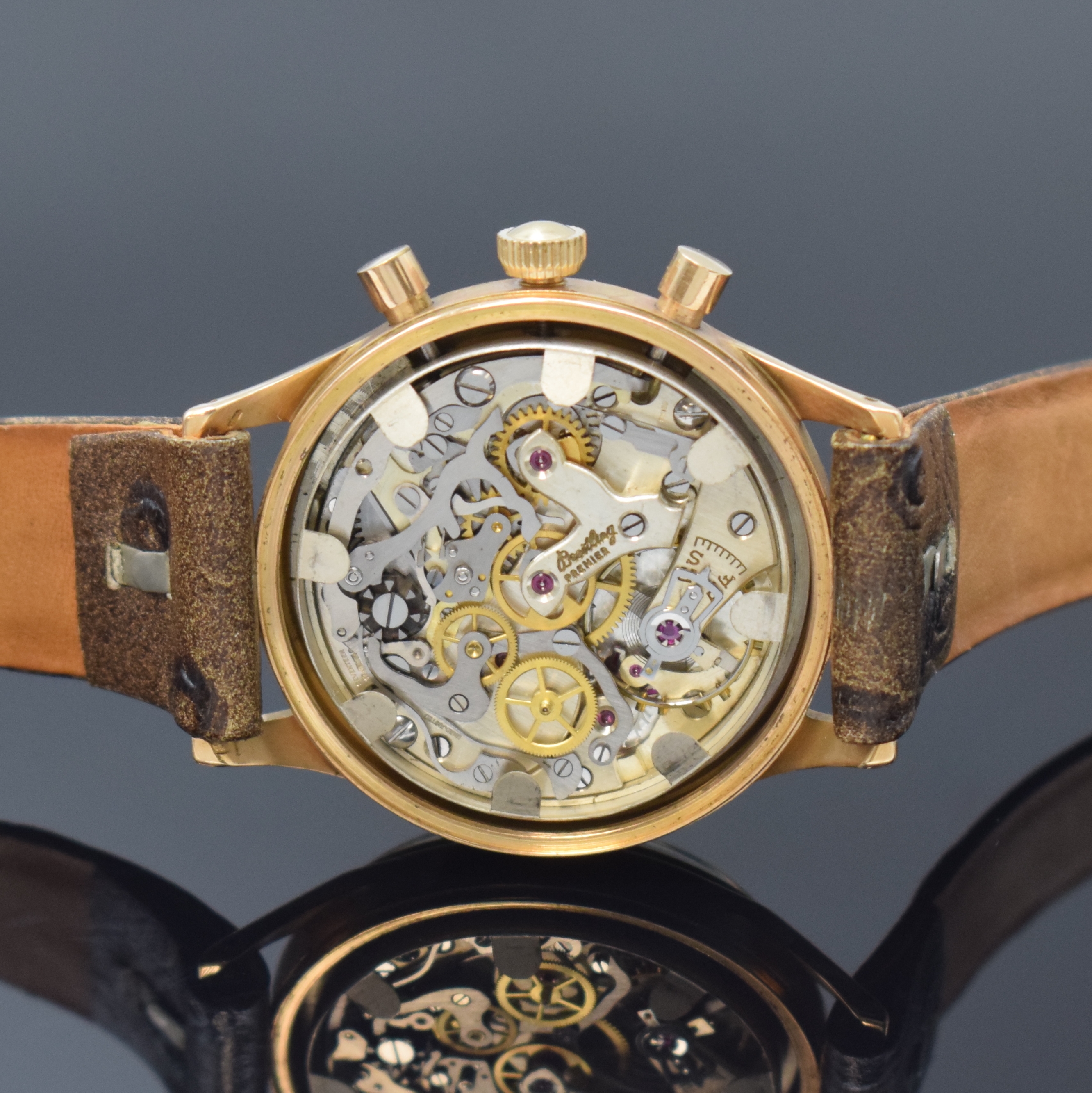 Detail d: BREITLING Premier Herrenchronograph in RG 750/000 Referenz 788, Schweiz um 1960, Handaufzug, Boden geschr., silb. Zifferbl. rest., arab. ...