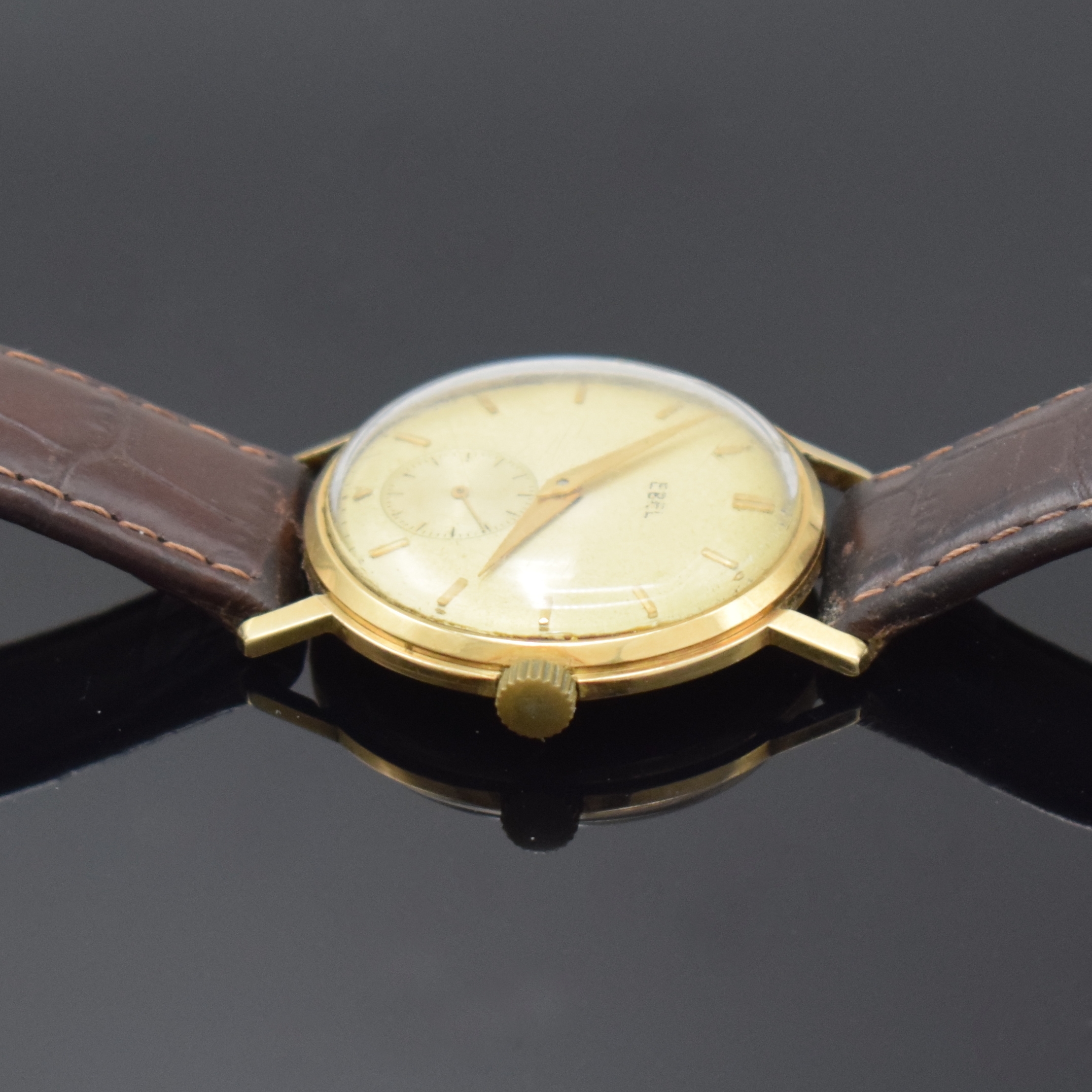 Detail f: EBEL Armbanduhr in GG 585/000, Schweiz um 1940, Boden und Glasrand aufgedr., Zifferbl. m. aufgel. Indizes altersbed. fl./pat., Rundankerw., Kal. 112, ...