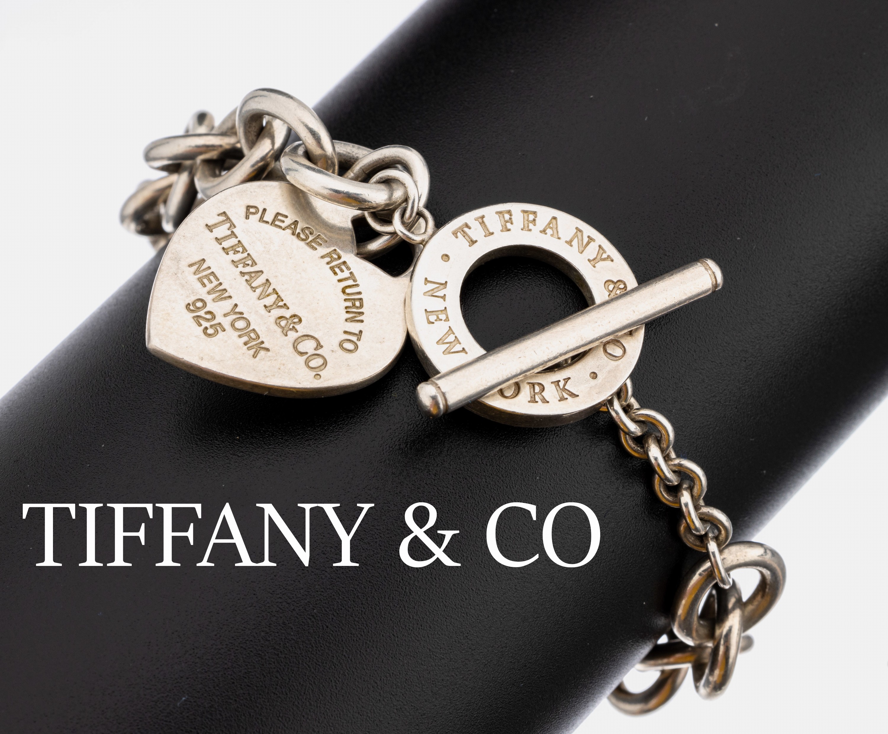 TIFFANY & CO. Armband, 925er Silber, runde Glieder, Herzabhängung, sign., L. ca. 17 cm