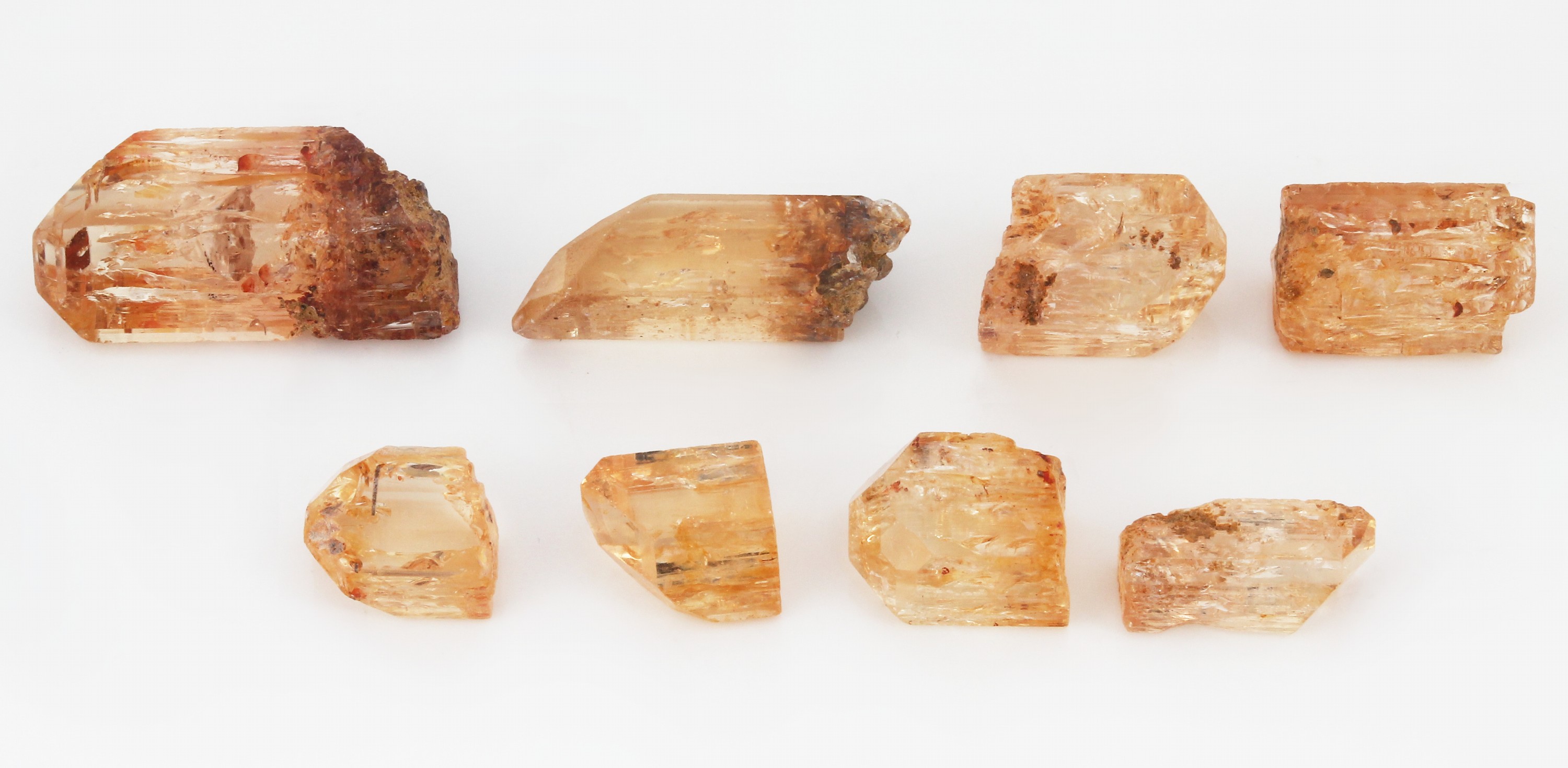 Detail a: Lot 8 lose Imperial Topas Rohsteine, zus. ca. 105.52 ct, versch. Größen und Formen