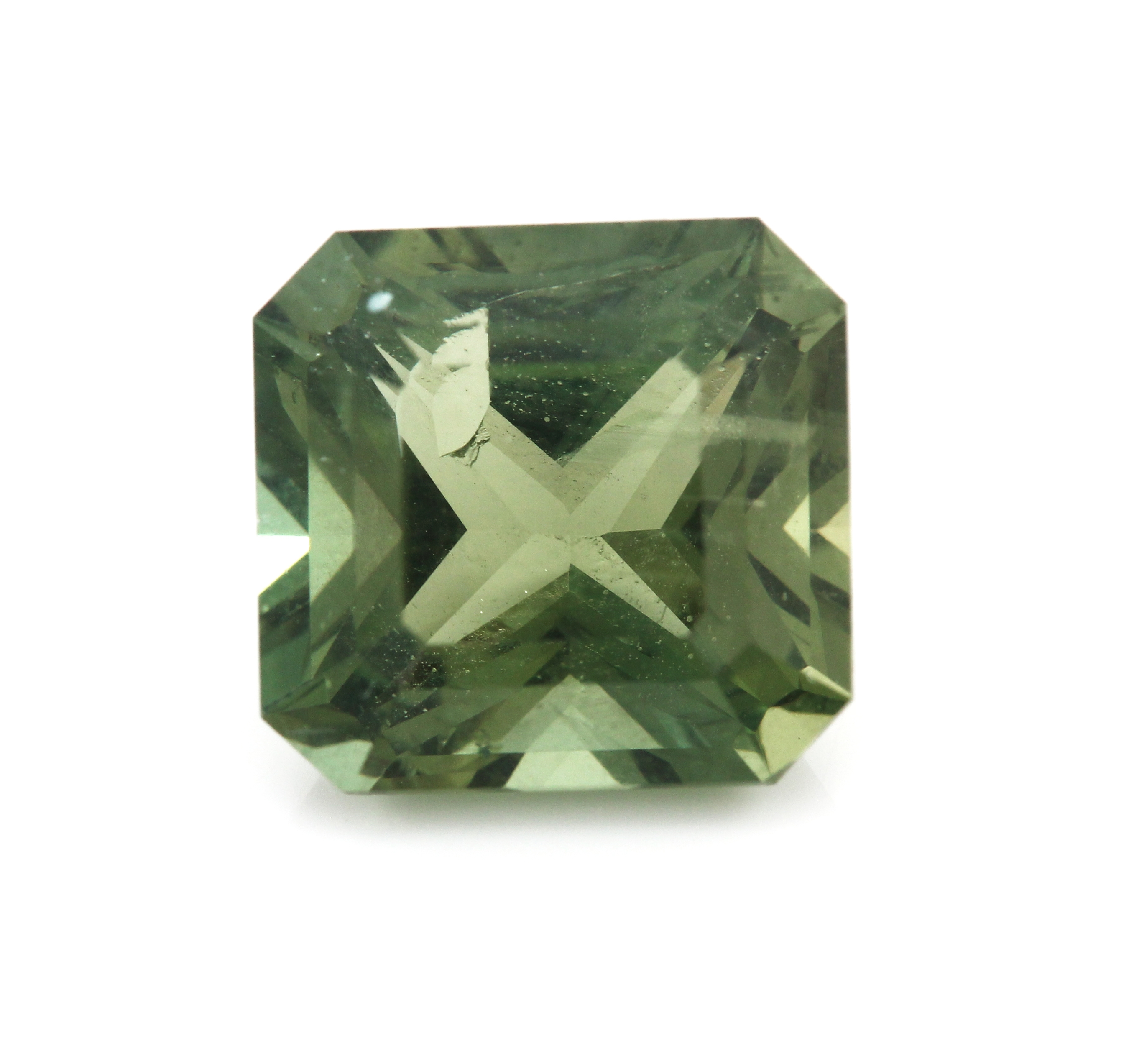 Loser grüner Zirkon, ca. 4.40 ct, oktogonaler Treppenschliff, Unterseite m. Ausbruch