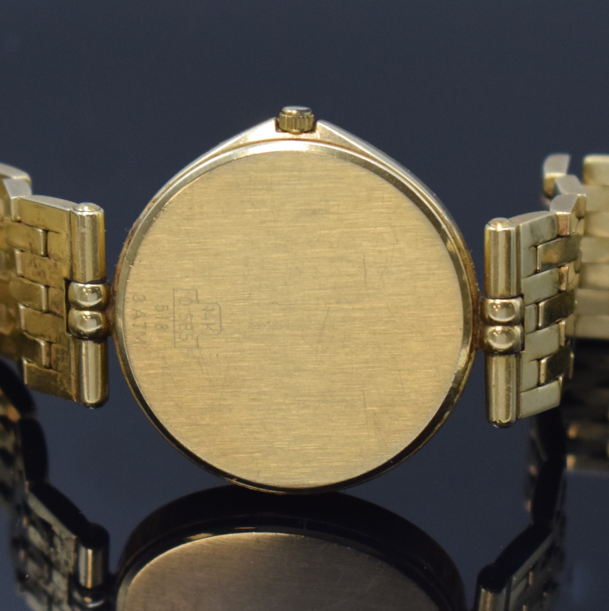 Detail d: PRIOSA Armbanduhr in GG 585/000 mit Diamanten, Schweiz um 1975, quarz, Goldband, Boden gedr., Lünette m. 4 Diamanten bes., cremefarb. Zifferbl. m. ...