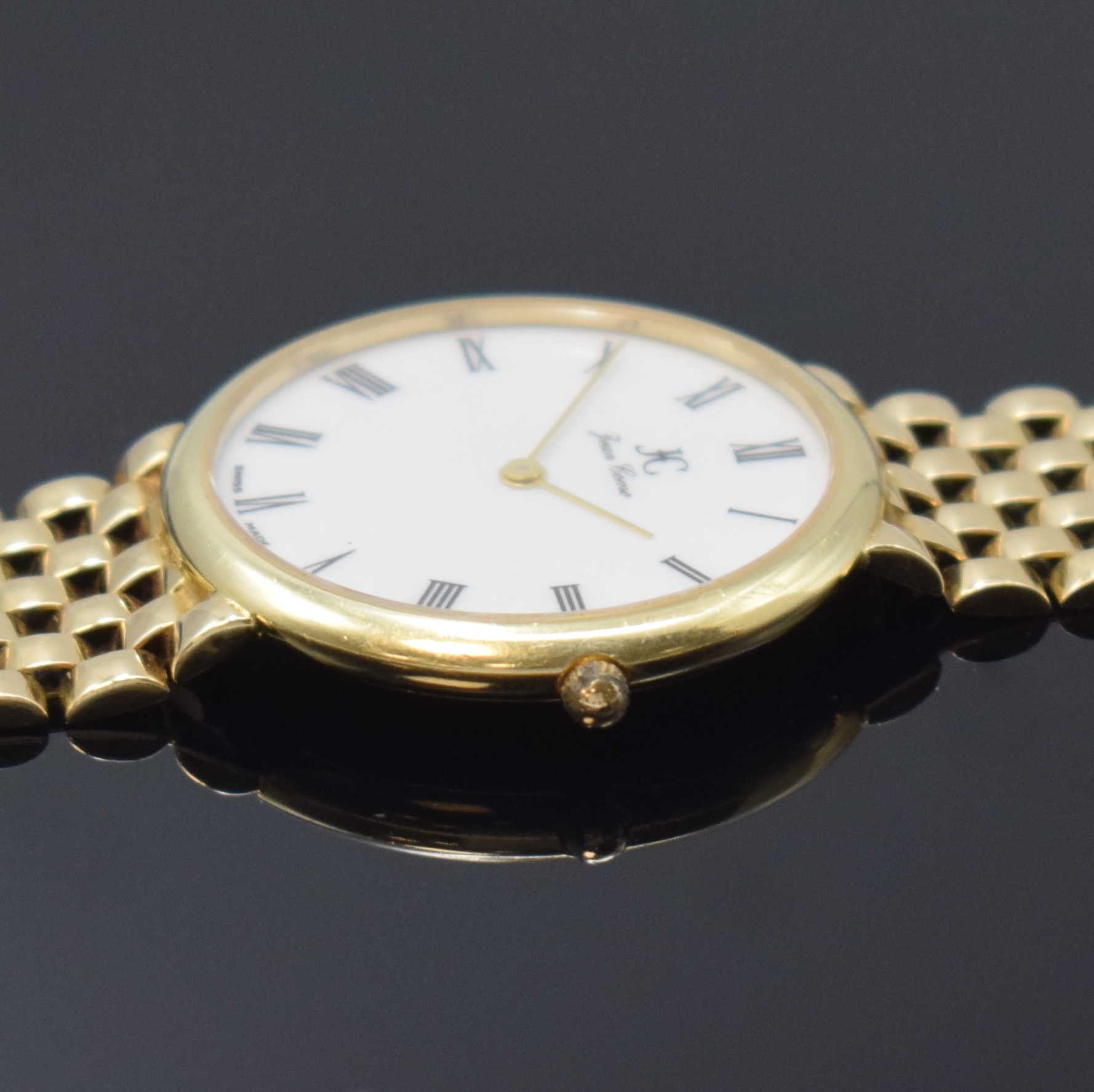 Detail c: JEAN COMO auf 498 Stück imitierte Armbanduhr in GG 585/000, Schweiz um 1980, quarz, Goldband, Boden aufgedr., weißes Zifferbl. m. röm. Zahlen, ...
