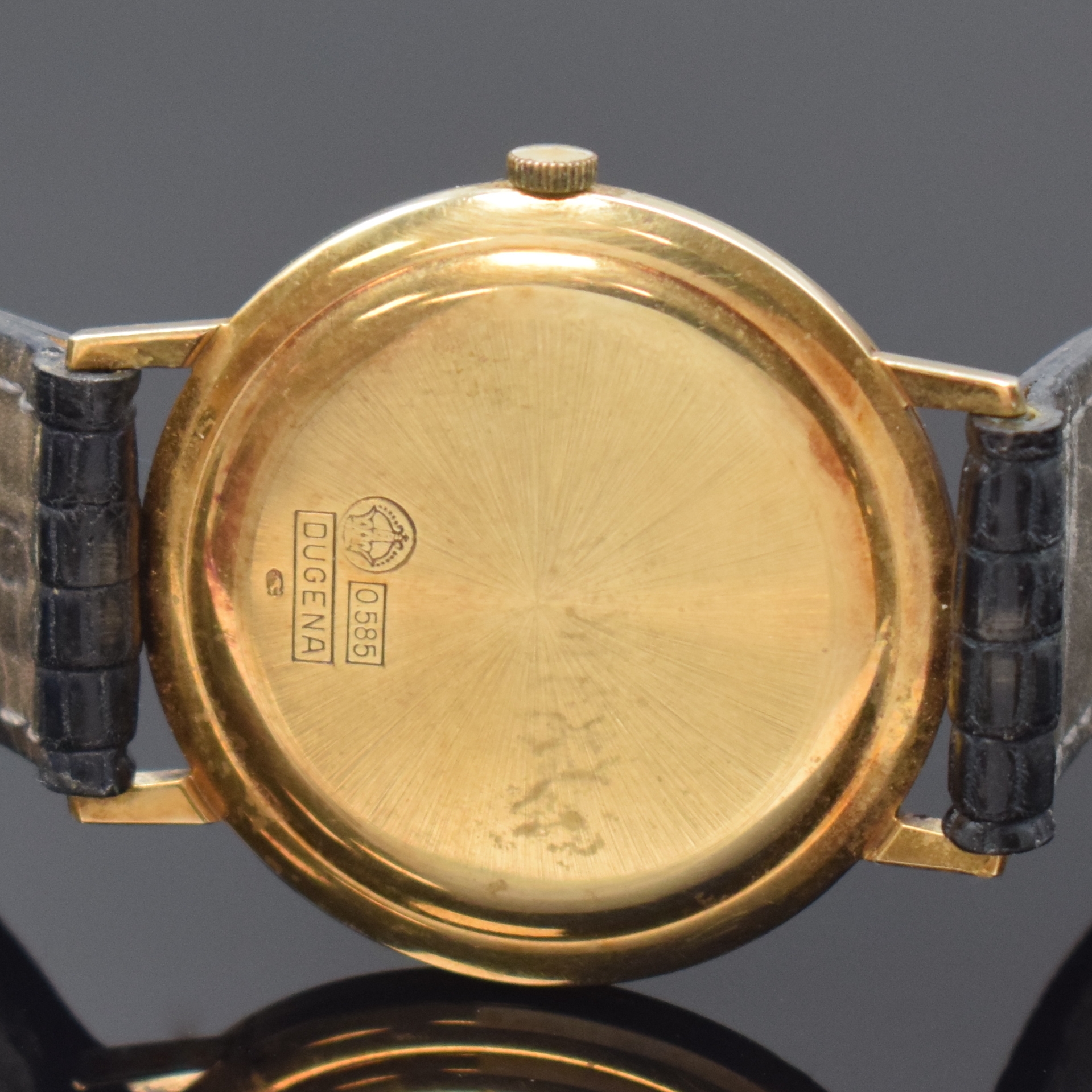 Detail c: DUGENA Precision Armbanduhr in GG 585/000, Schweiz um 1970, Handaufzug, Glasrand aufgedr., silb. Zifferbl. m. gold. Std.-Ind., gold. Zeiger, sign ...
