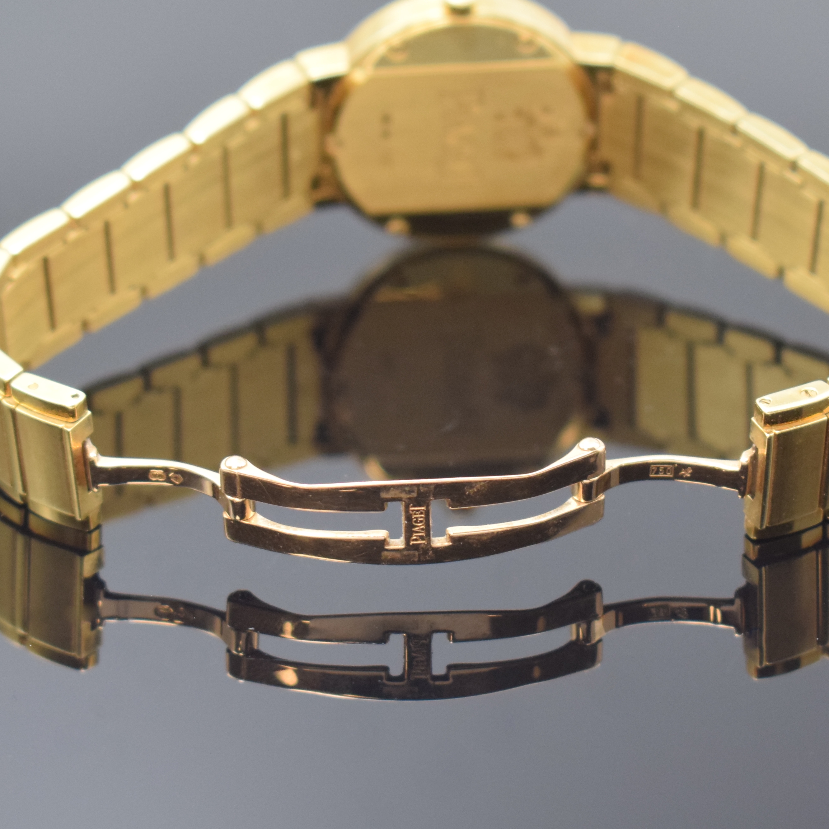 Detail b: PIAGET Polo Damenarmbanduhr in GG 750/000 Referenz 27500, Schweiz um 2000, quarz, orig, Goldband m. dopp. Faltschl., Boden 6- fach verschr., silb. ...