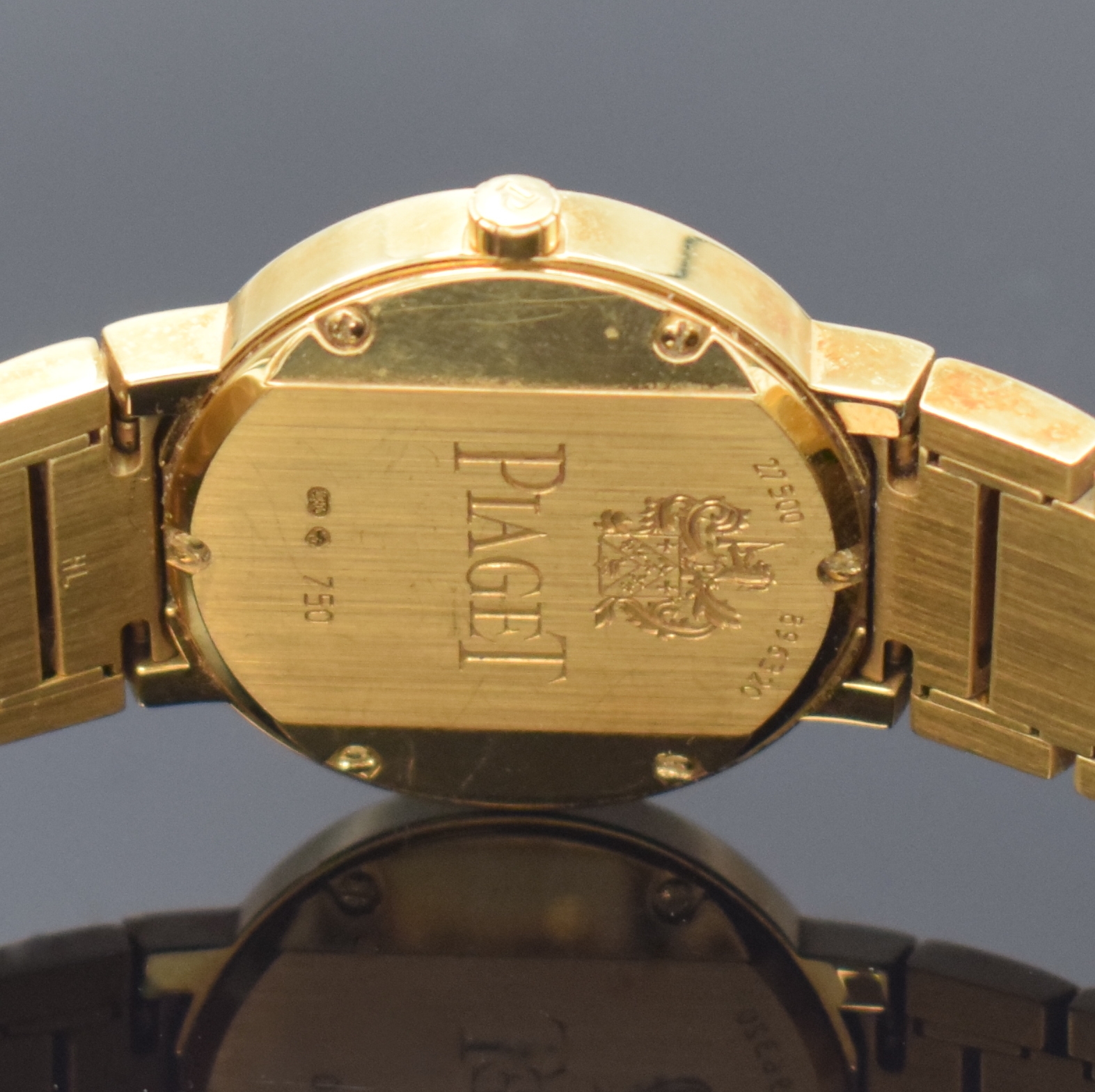 Detail d: PIAGET Polo Damenarmbanduhr in GG 750/000 Referenz 27500, Schweiz um 2000, quarz, orig, Goldband m. dopp. Faltschl., Boden 6- fach verschr., silb. ...