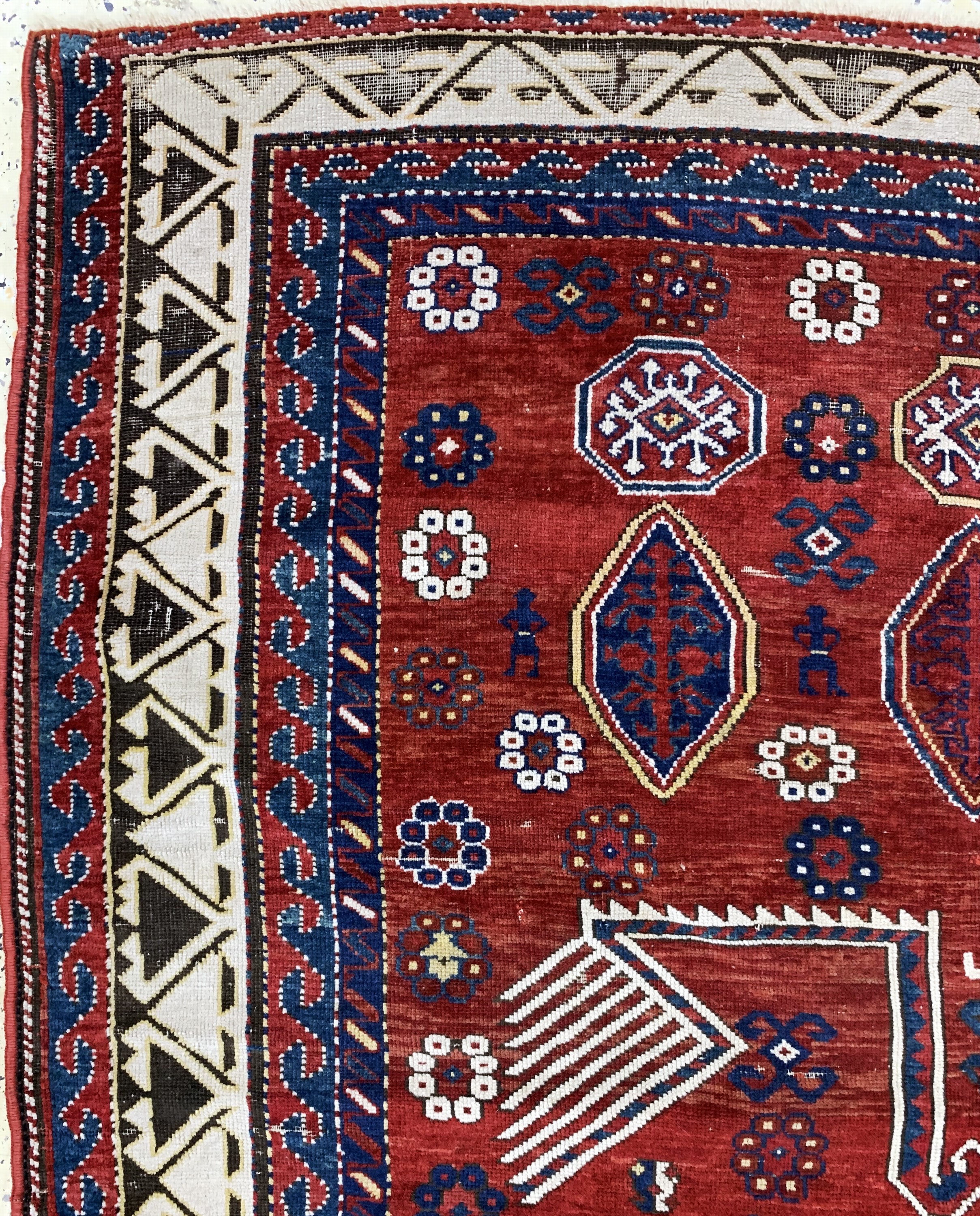Detail d: Antiker Kazak, Kaukasus, 19.Jhd, Wolle auf Wolle, ca. 285 x 160 cm, EHZ: 4, (mehrfach zusammengesetzt & restauriert).