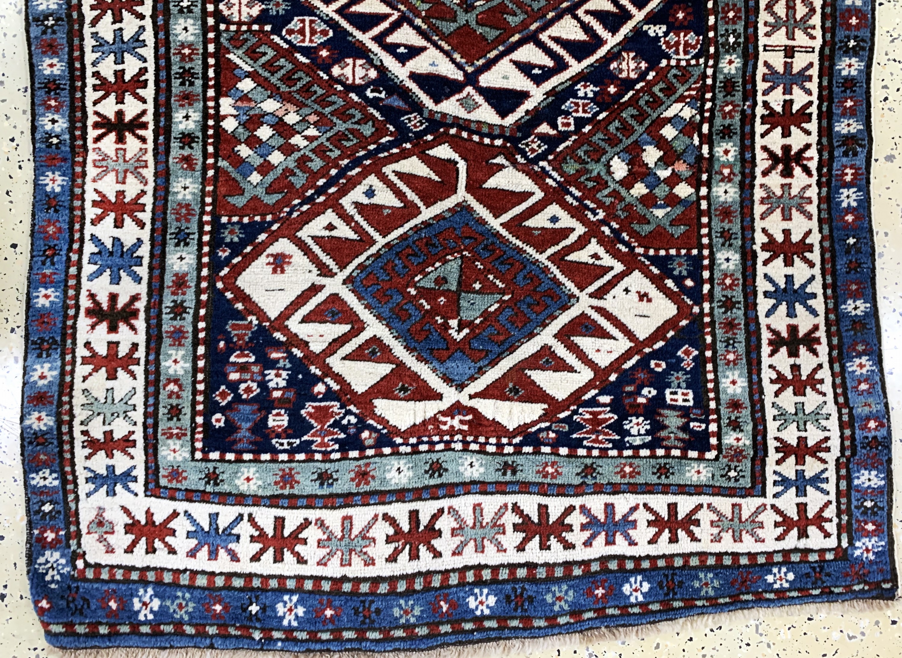 Detail b: Antiker Kazak"Shulaver", Kaukasus, 19.Jhd, Wolle auf Wolle, ca. 290 x 111 cm, EHZ: 3